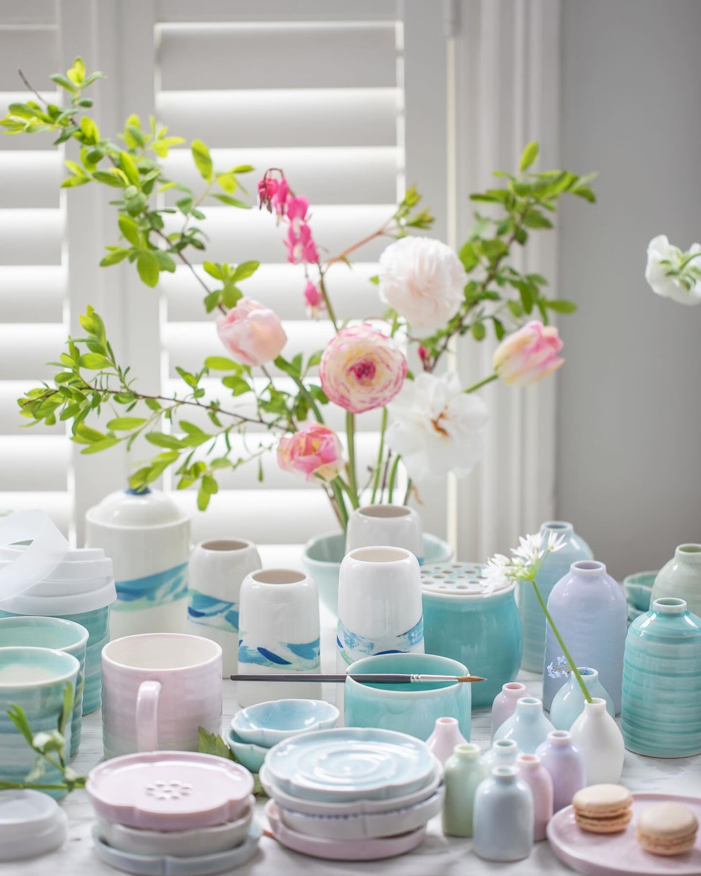 A feast for pastel-lovers:  enjoy this behind-the-scenes snapshot. 🍧🌸🤍

After a day shooting my handmade ceramics this scene caught my eye and was captured beautifully by @tamsynmorgansphotography .

Altered forms to create petals, embossed floral