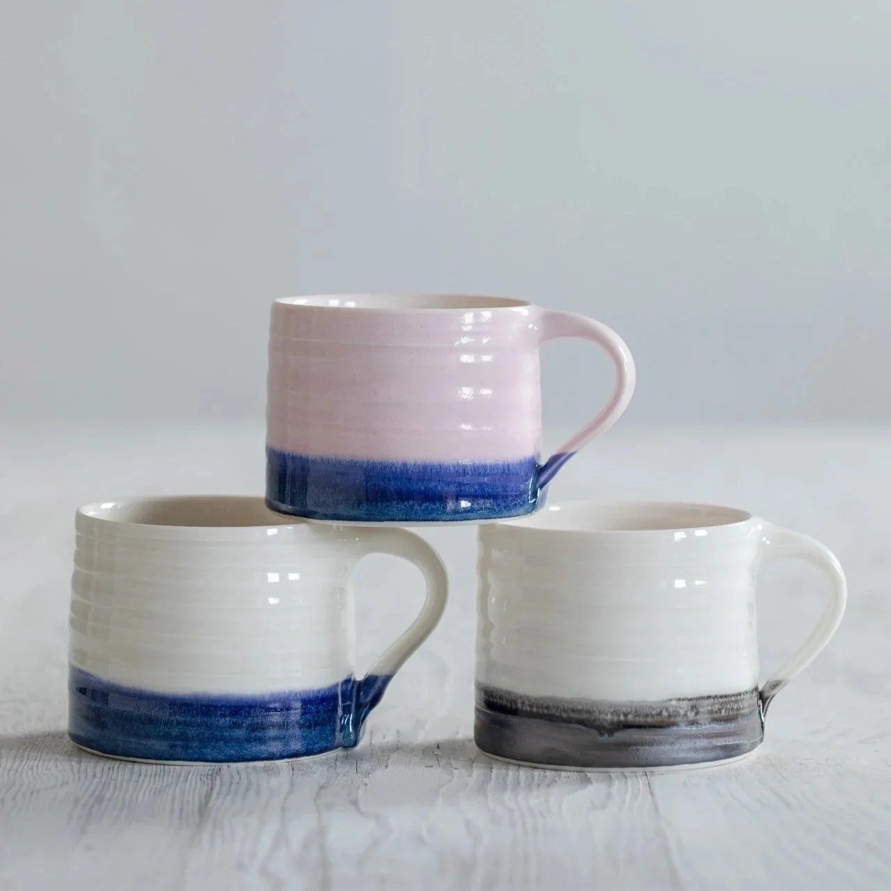 Porcelain+mugs+with+handpulled+handle.jpg