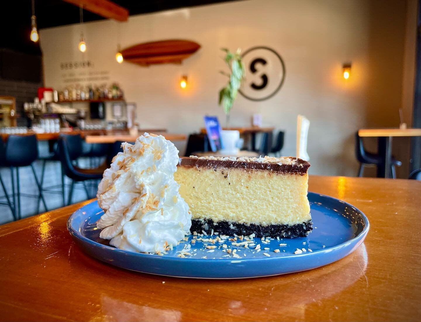 Get ready to sweeten up Mother's Day weekend with the return of our Nanaimo Bar cheesecake! This delightful dessert features a fluffy, custard cheesecake atop a chewy chocolate coconut crust, topped with a rich chocolate ganache, vanilla whipped crea