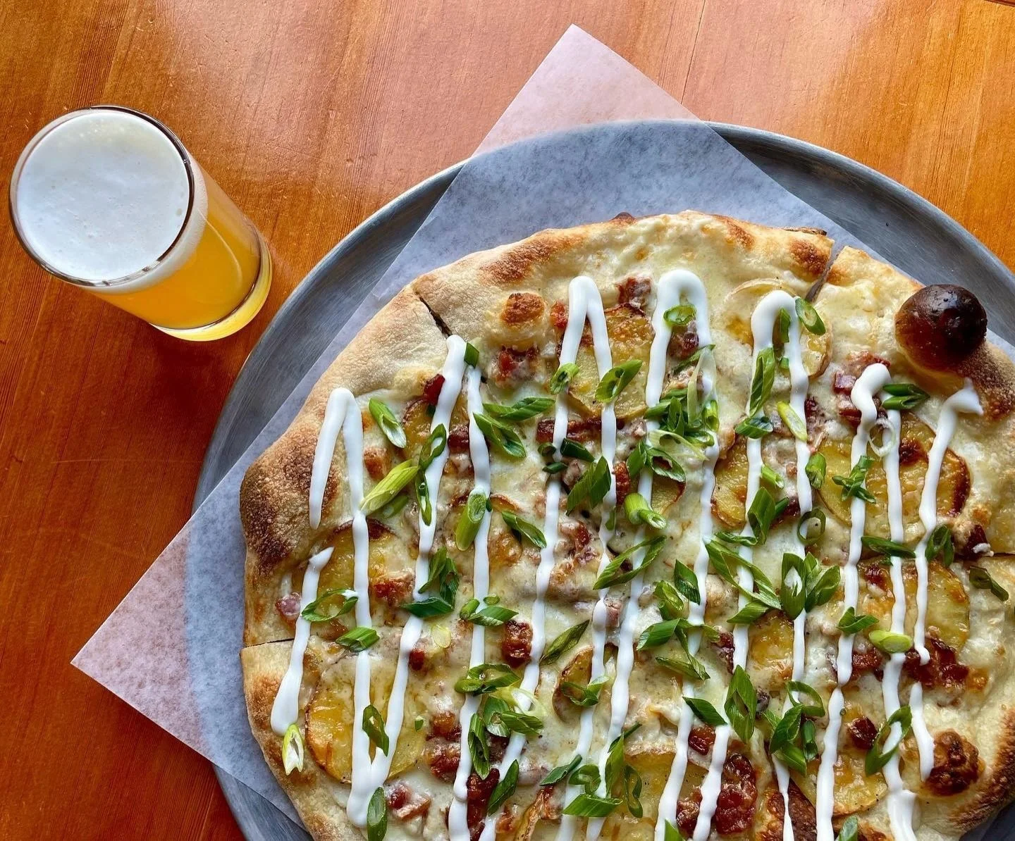 🍀Join us tomorrow for Classic St. Patty&rsquo;s features and Happy Hour! 🍀

The Features:  Baked Potato Pizza: B&eacute;chamel base, sliced potatoes, Two Rivers&rsquo; double smoked bacon, mozzarella, smoked cheddar, green onions, and a sour cream 