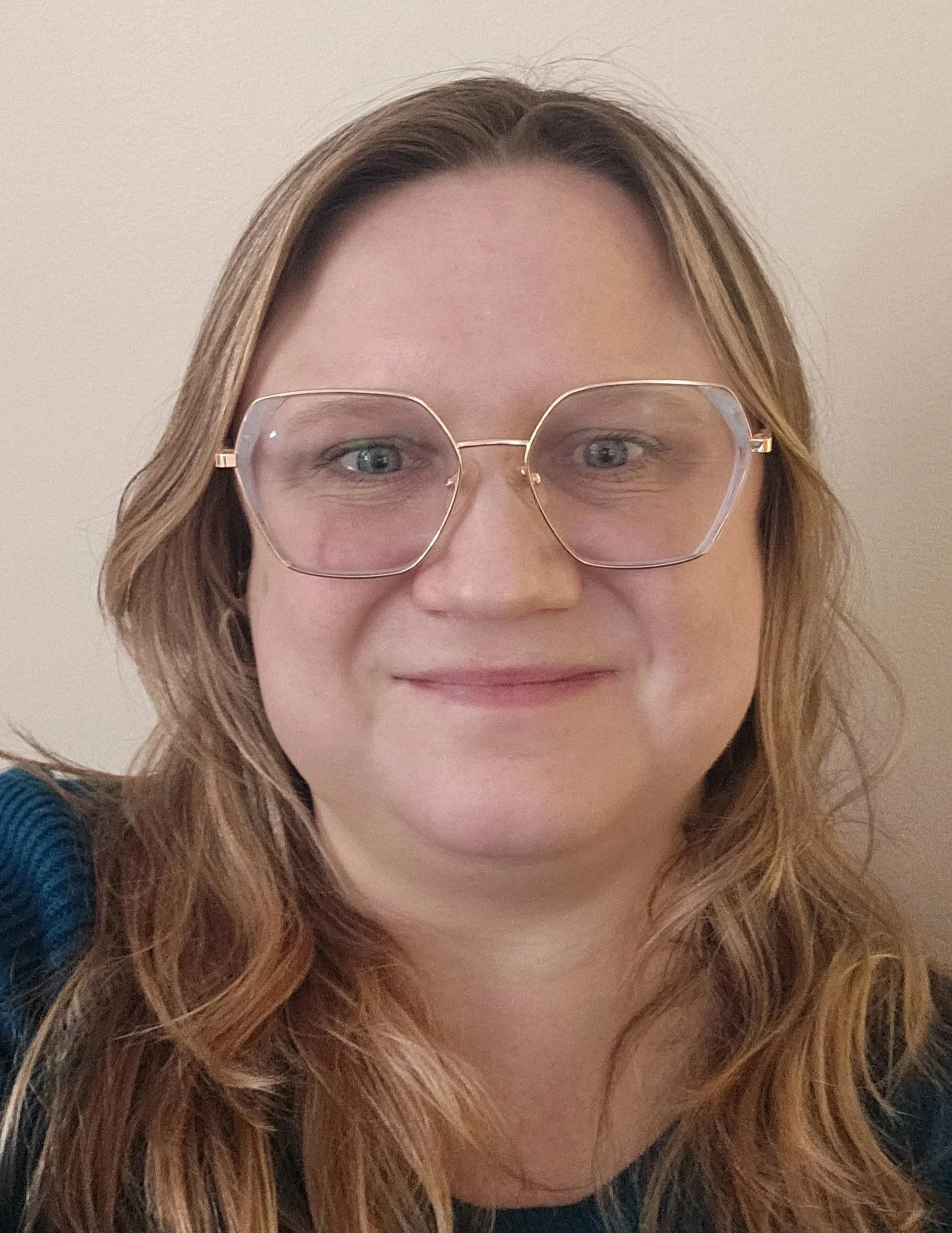 Professional portrait of Katheryn Brauckmann, LCSW, founder and licensed trauma therapist at Totum Counseling in Downingtown, PA.