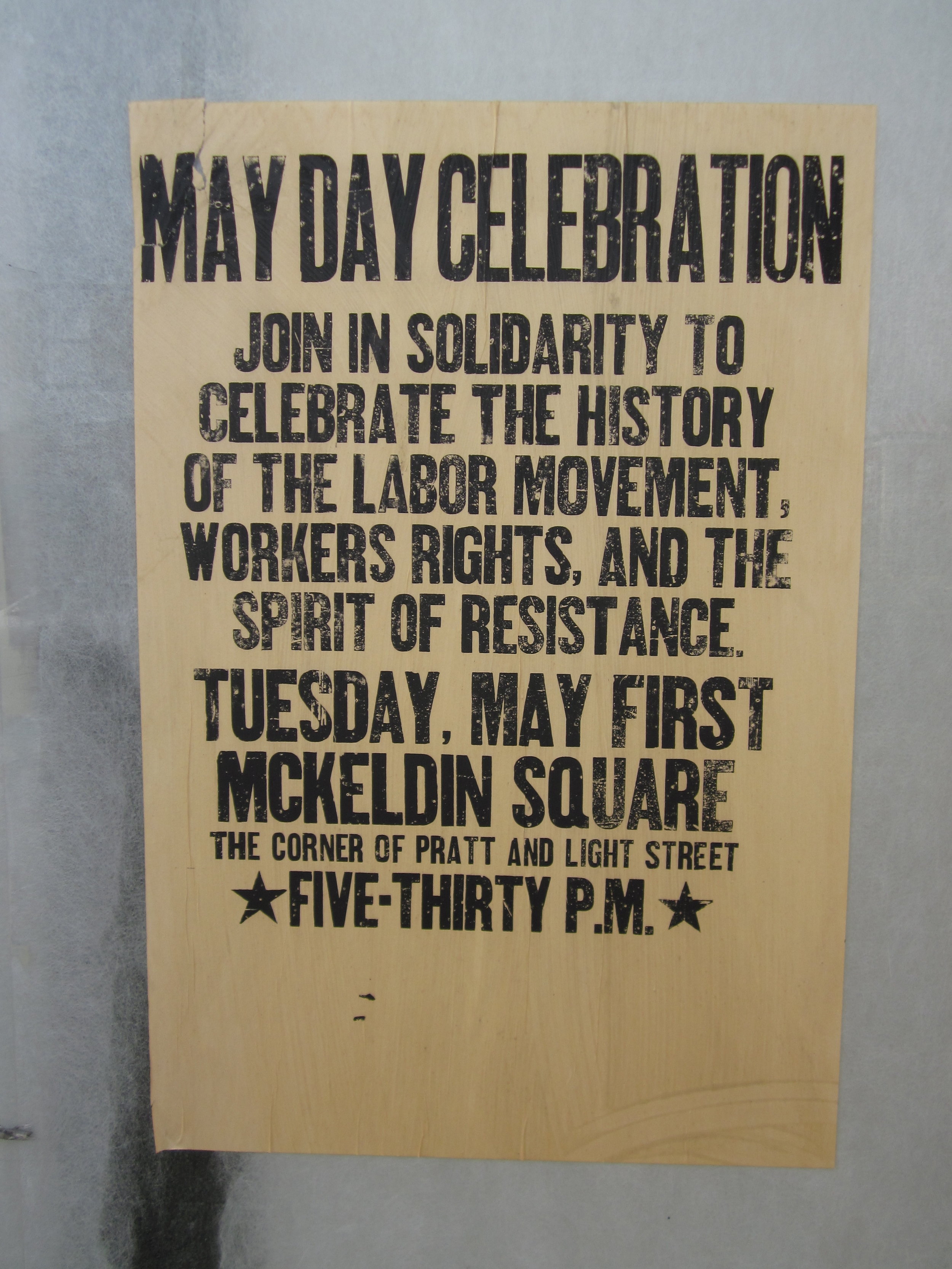  A letterpress wheatpasted poster for a May Day rally in Baltimore.  