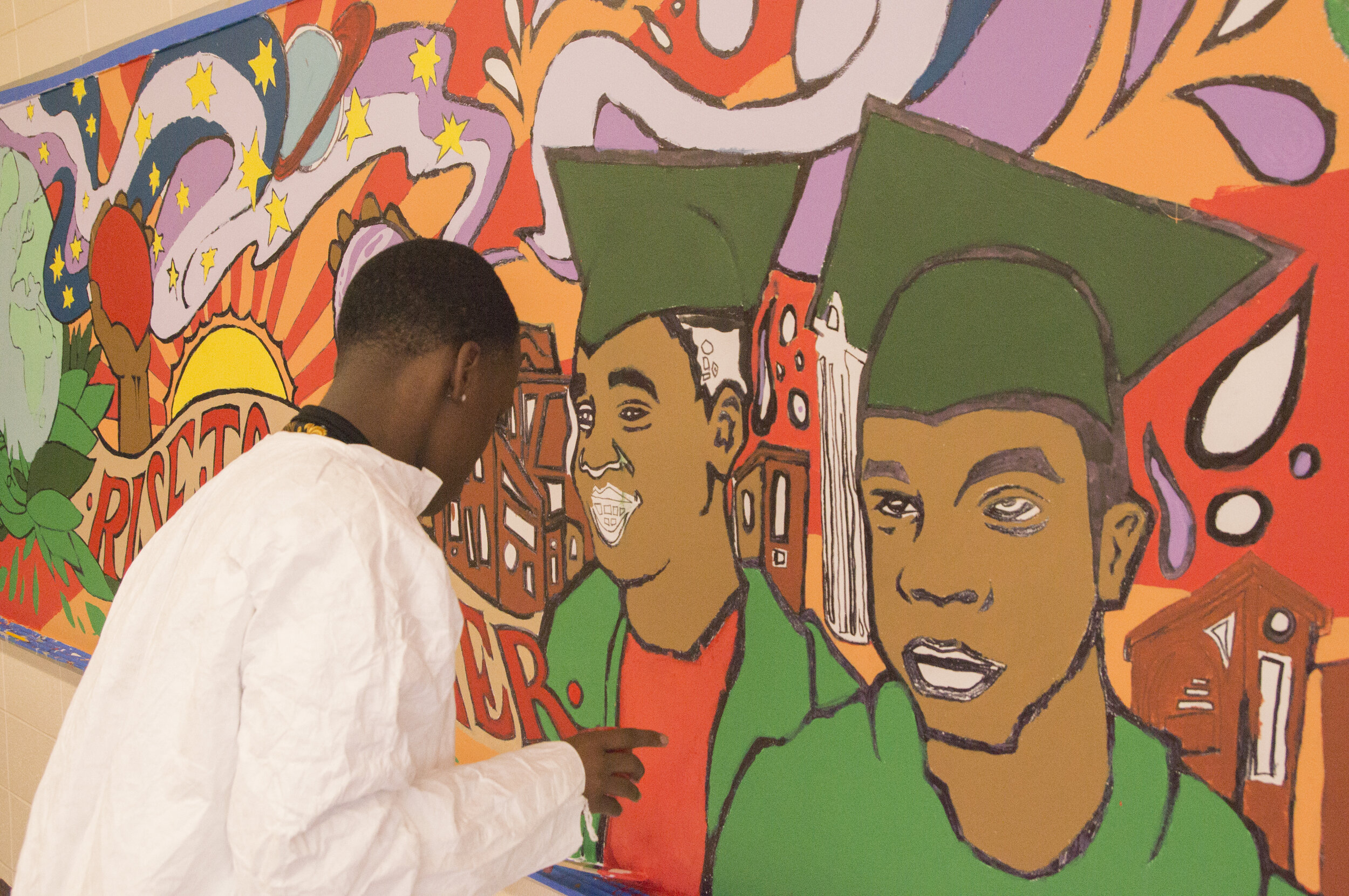  Madison Students paint murals in the Peace Room and Restorative Practices Room. 