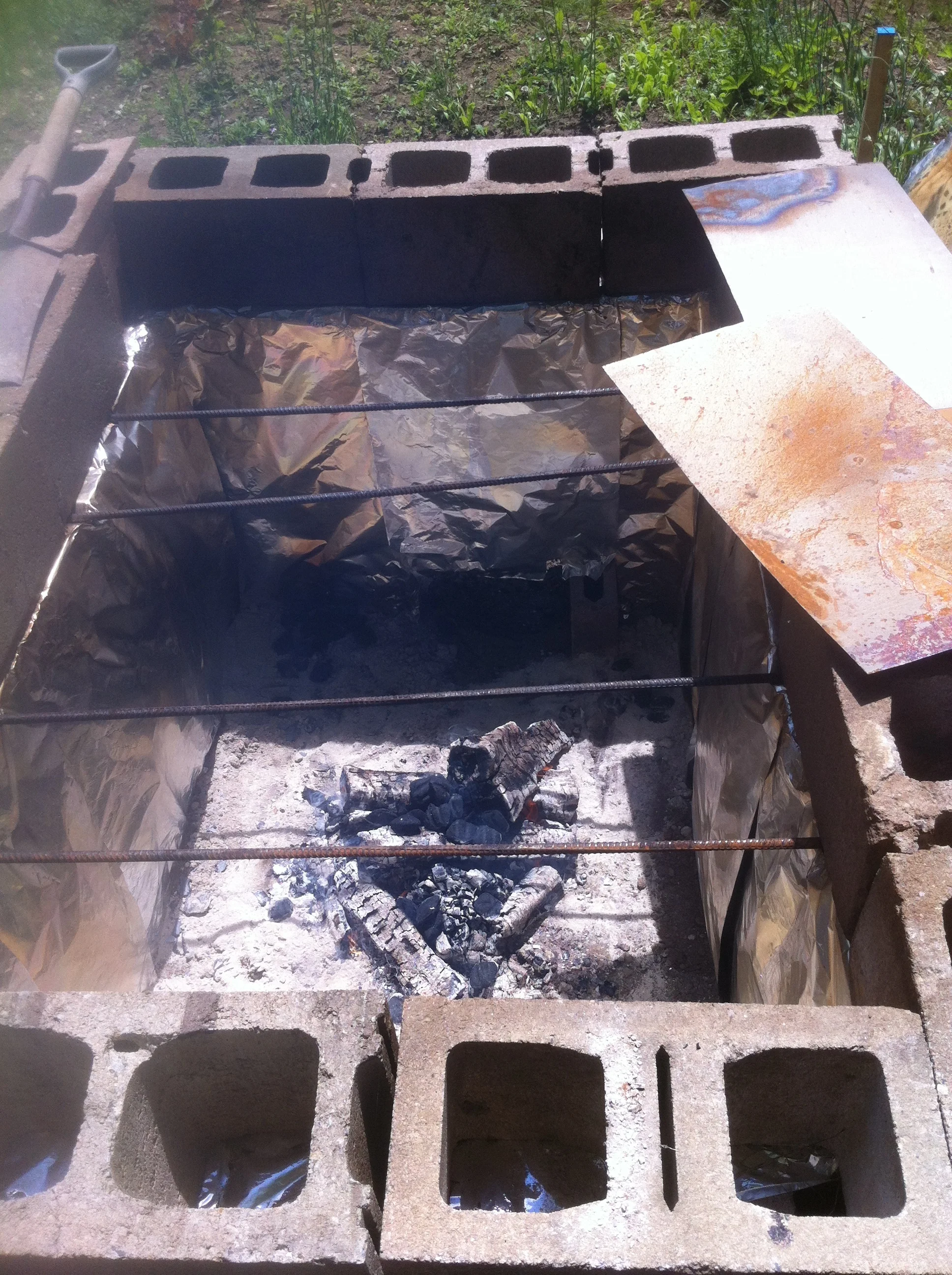  Warm up fire. Charcoal and wood.  