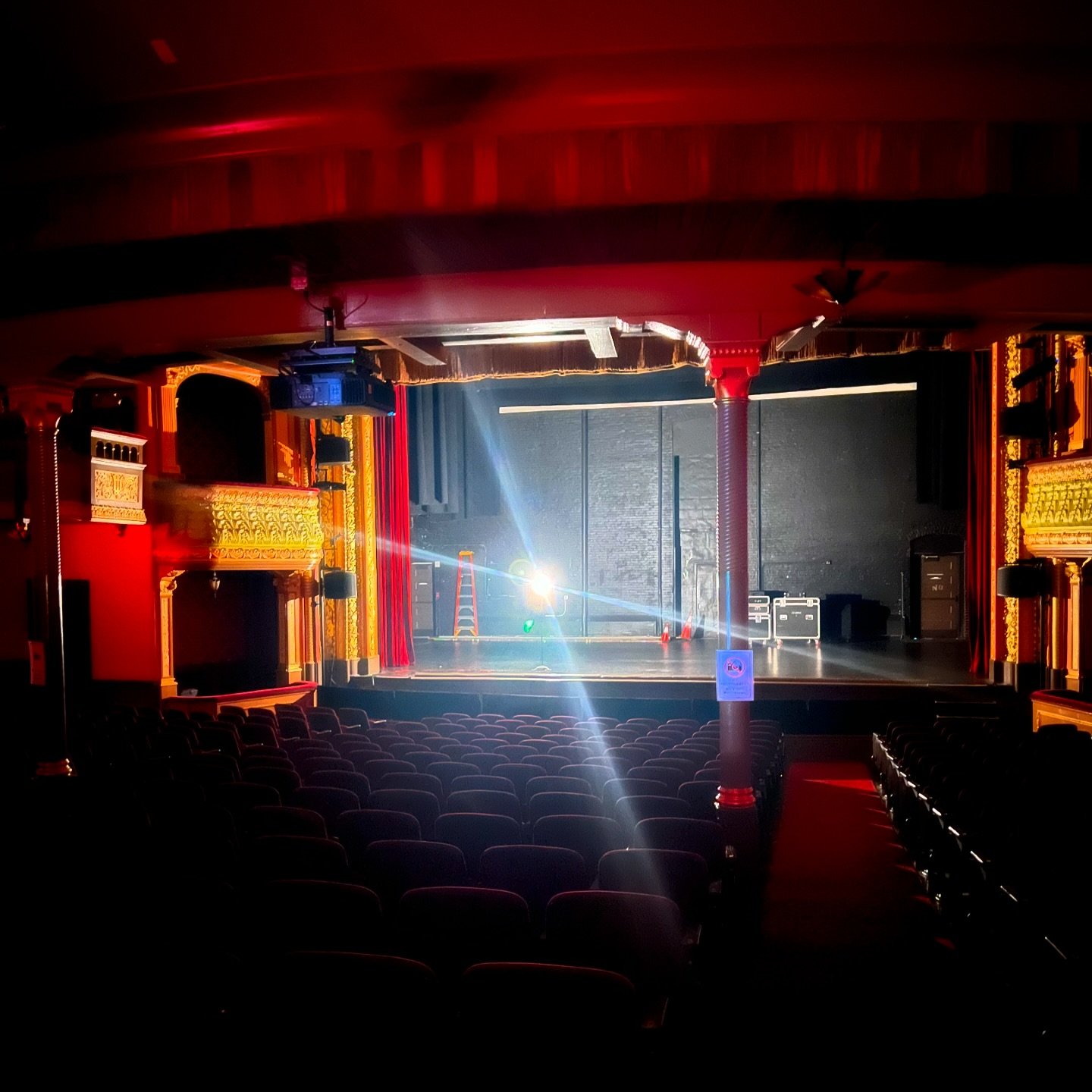 As I step into my office at @aomtheatre, the hollow echoes of my footsteps bounce off the aged walls of the historical theater, each creak of the floorboards whispering tales of performances long past. The air is thick with memories, the scent of wor