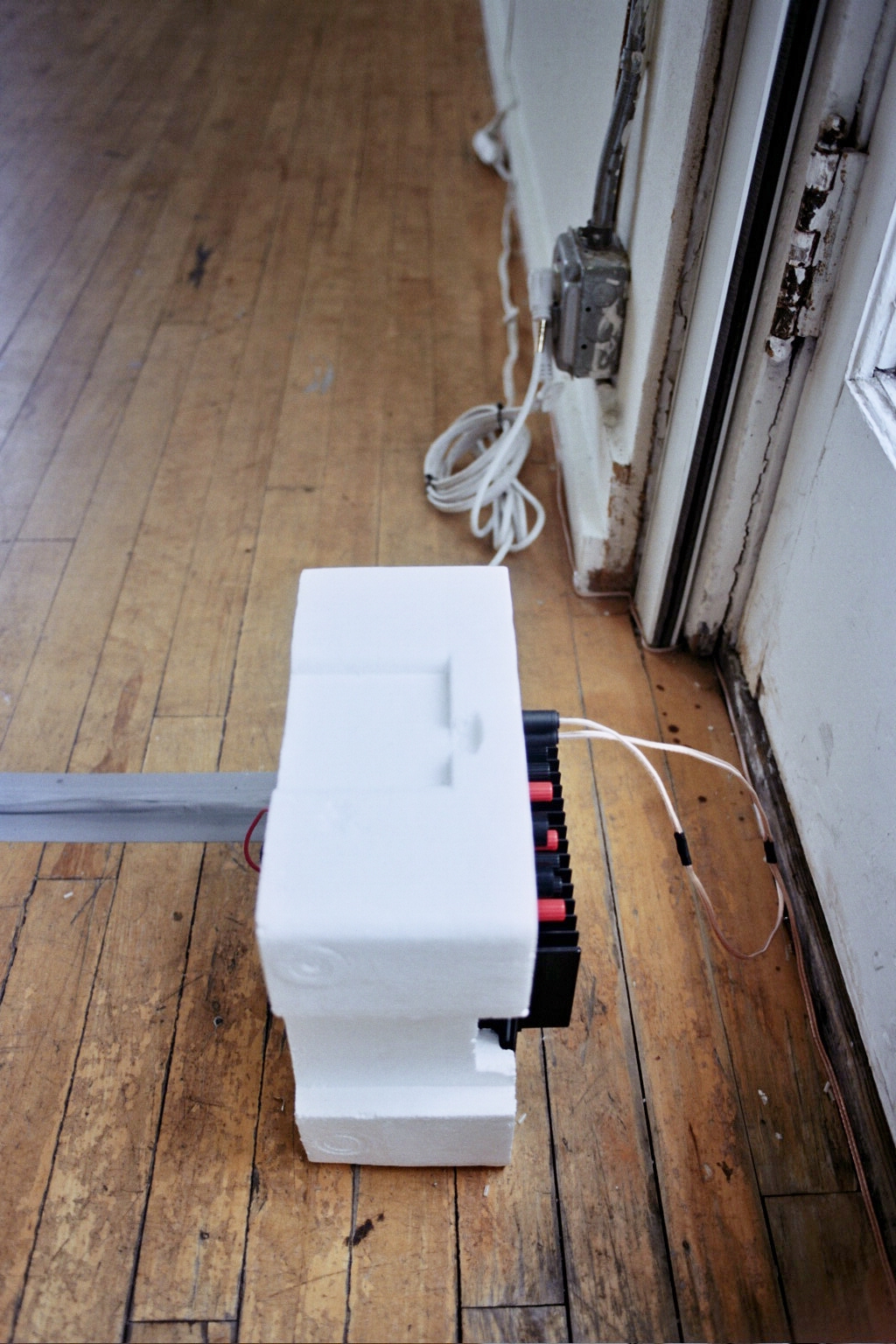 The foam that the amplifier came packed with makes a suitable fixture.
