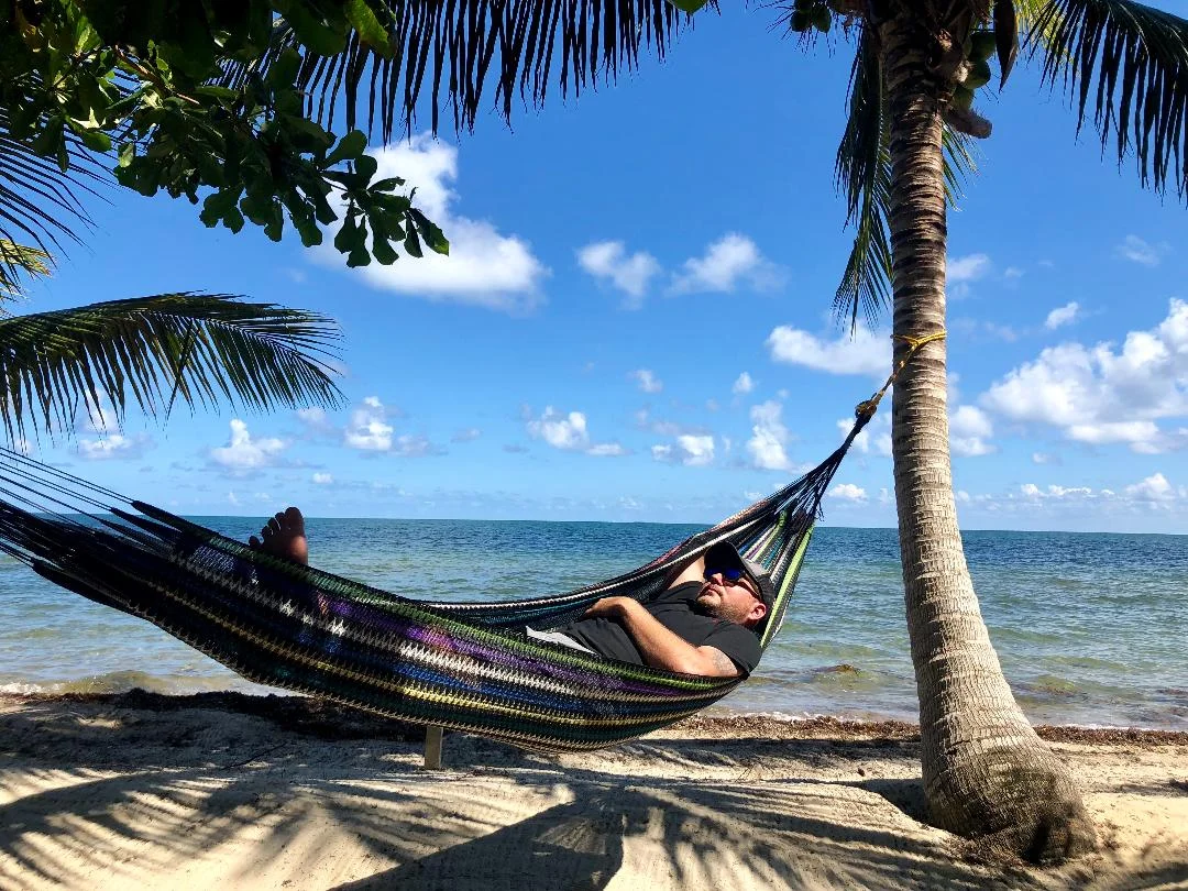 AJ lounging in the hammock.