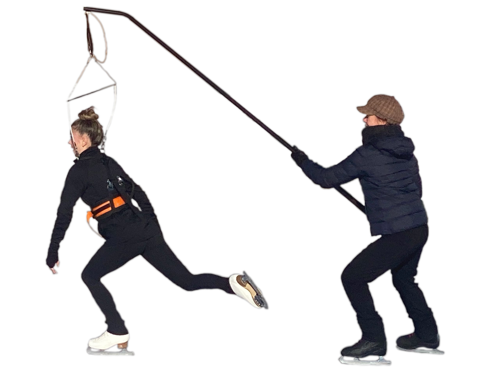 a coach and skater using an Irvine Designs hand held jump harness