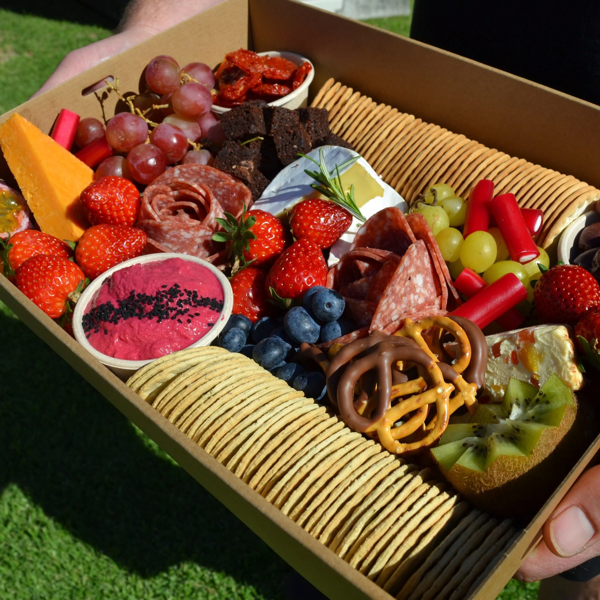 Last chance to order your Christmas Grazing Boxes! 🎄

Enjoy a mouth-watering mix of soft and hard cheeses, cured meat, beetroot hummus dip, seasonal fruit, choc dipped pretzels and assorted crackers. Serves 8-10 people.

Available for pickup on the 