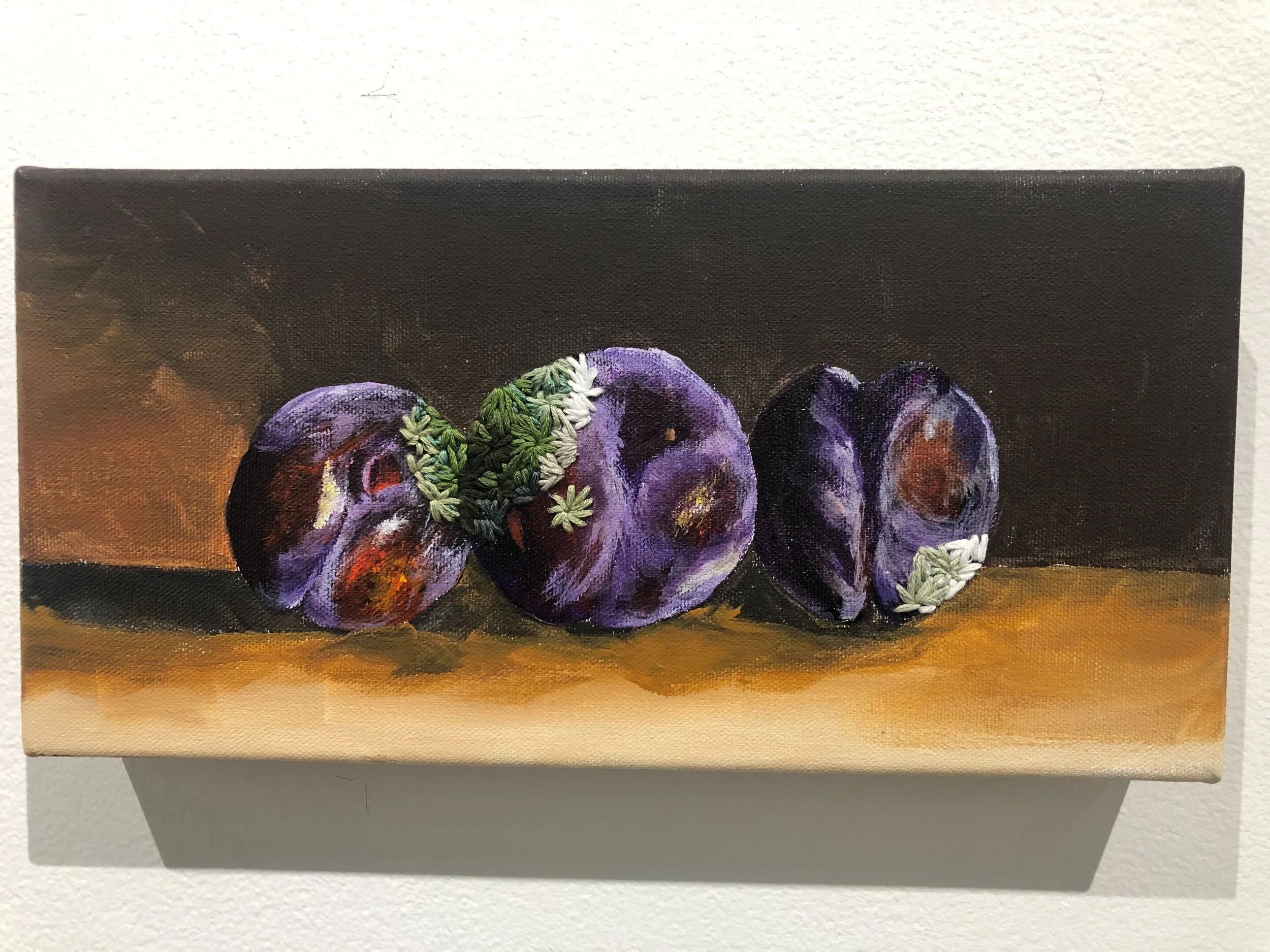 Juicy, acrylic, embroidery on canvas, 6 x 12 inches, courtesy of the artist.