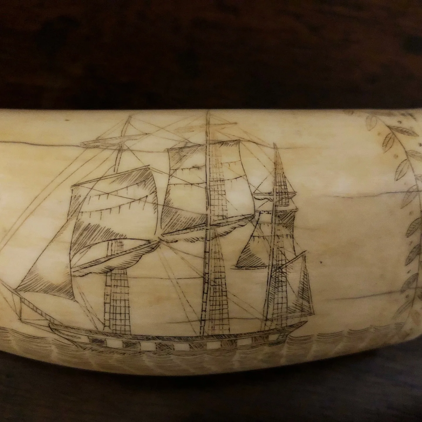 antique whales tooth with whaling scene