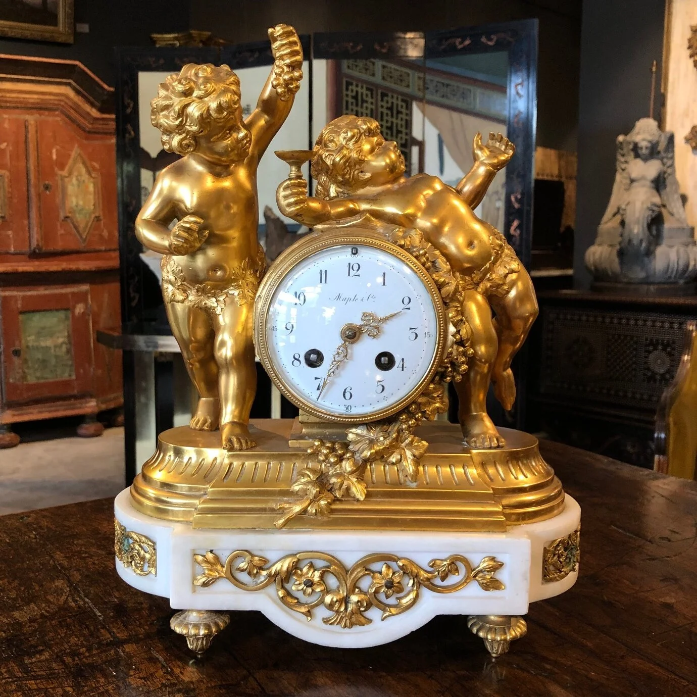 Late 19th century mantle clock retailed by Maple &amp; Co, French circa 1880.