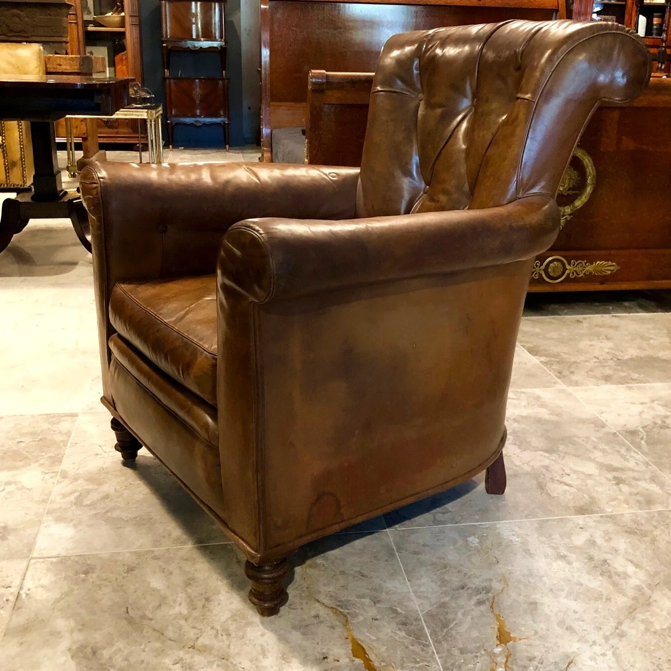 A charming late 19th century leather arm chair, circa 1890 antique