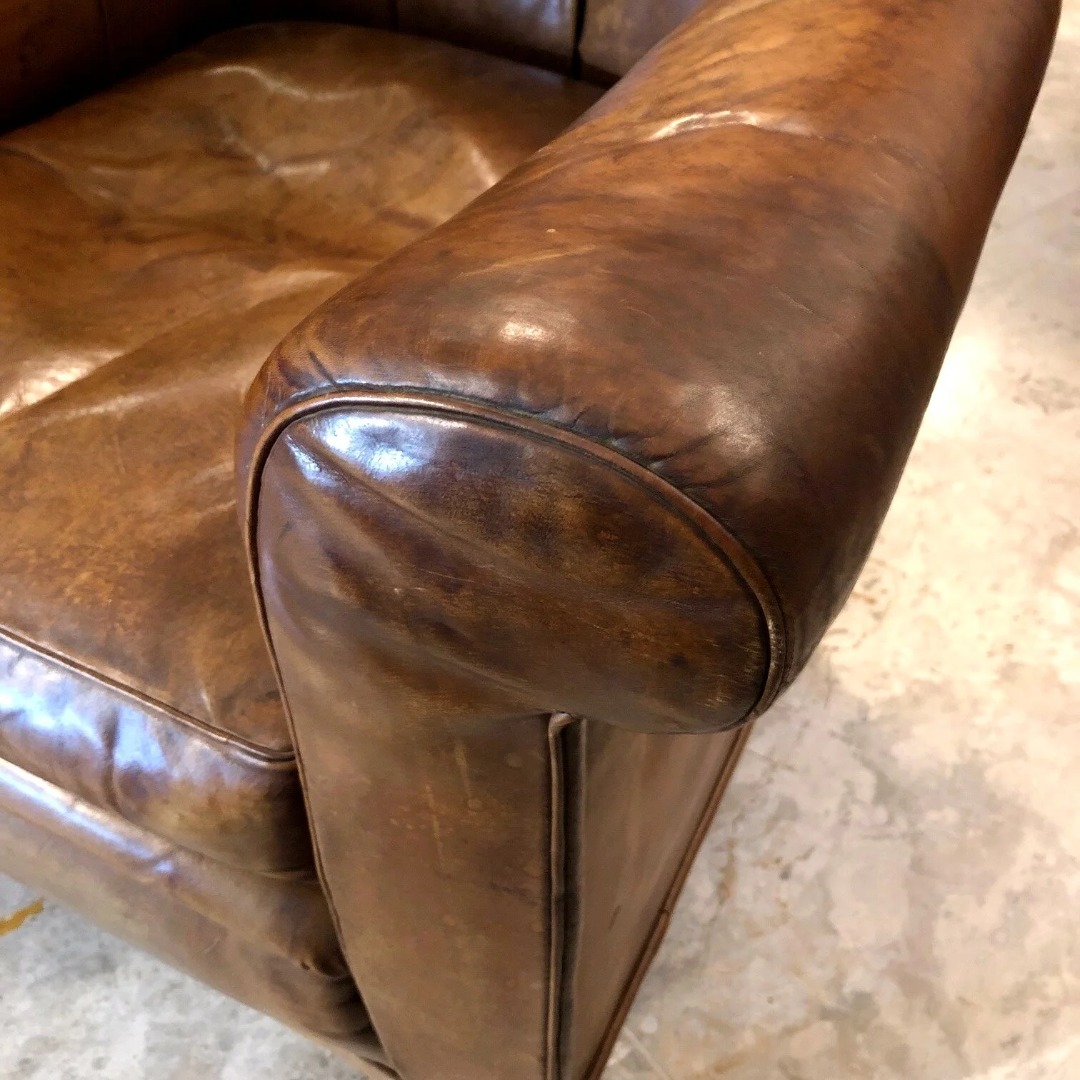 A charming late 19th century leather arm chair, circa 1890 antique