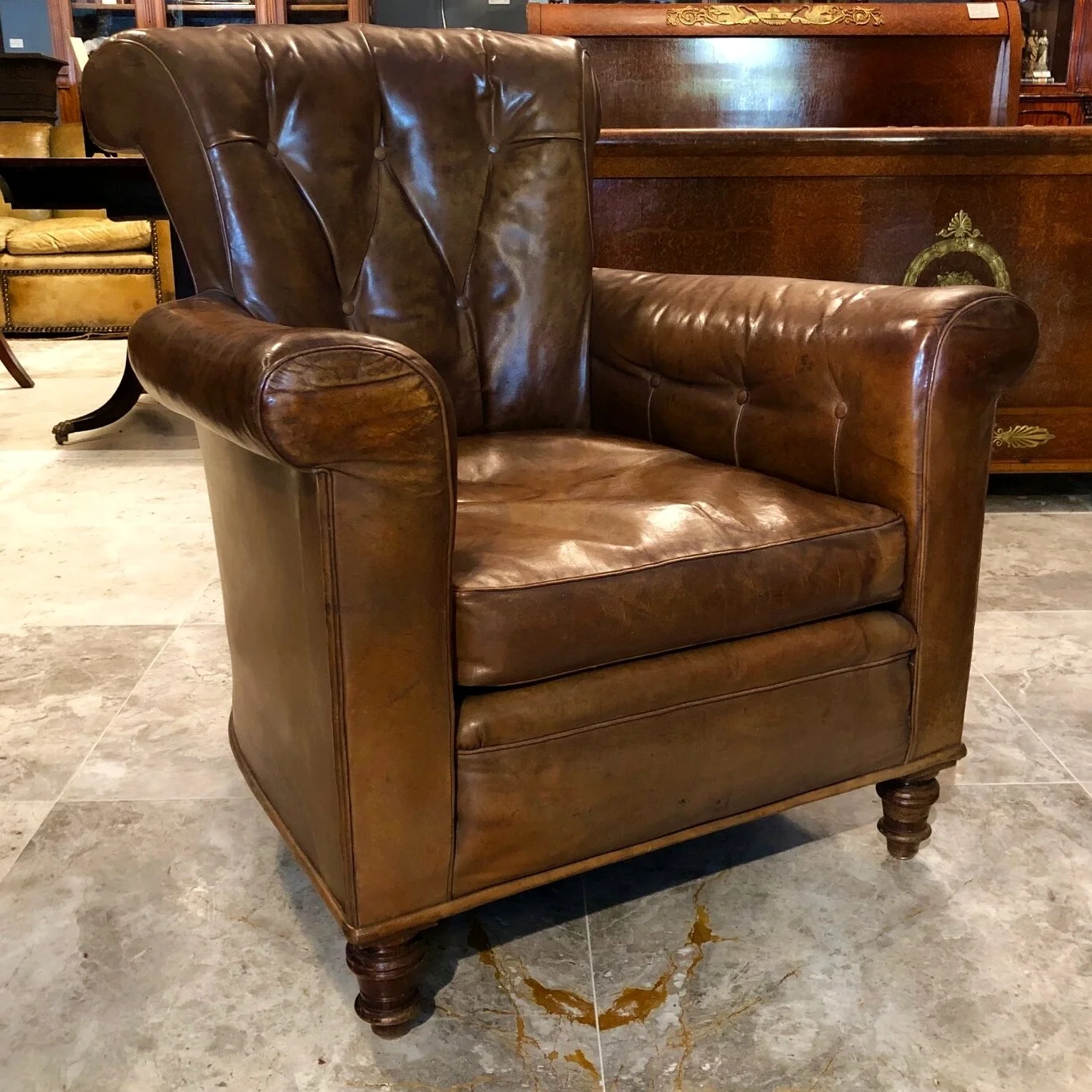 A charming late 19th century leather arm chair, circa 1890 antique