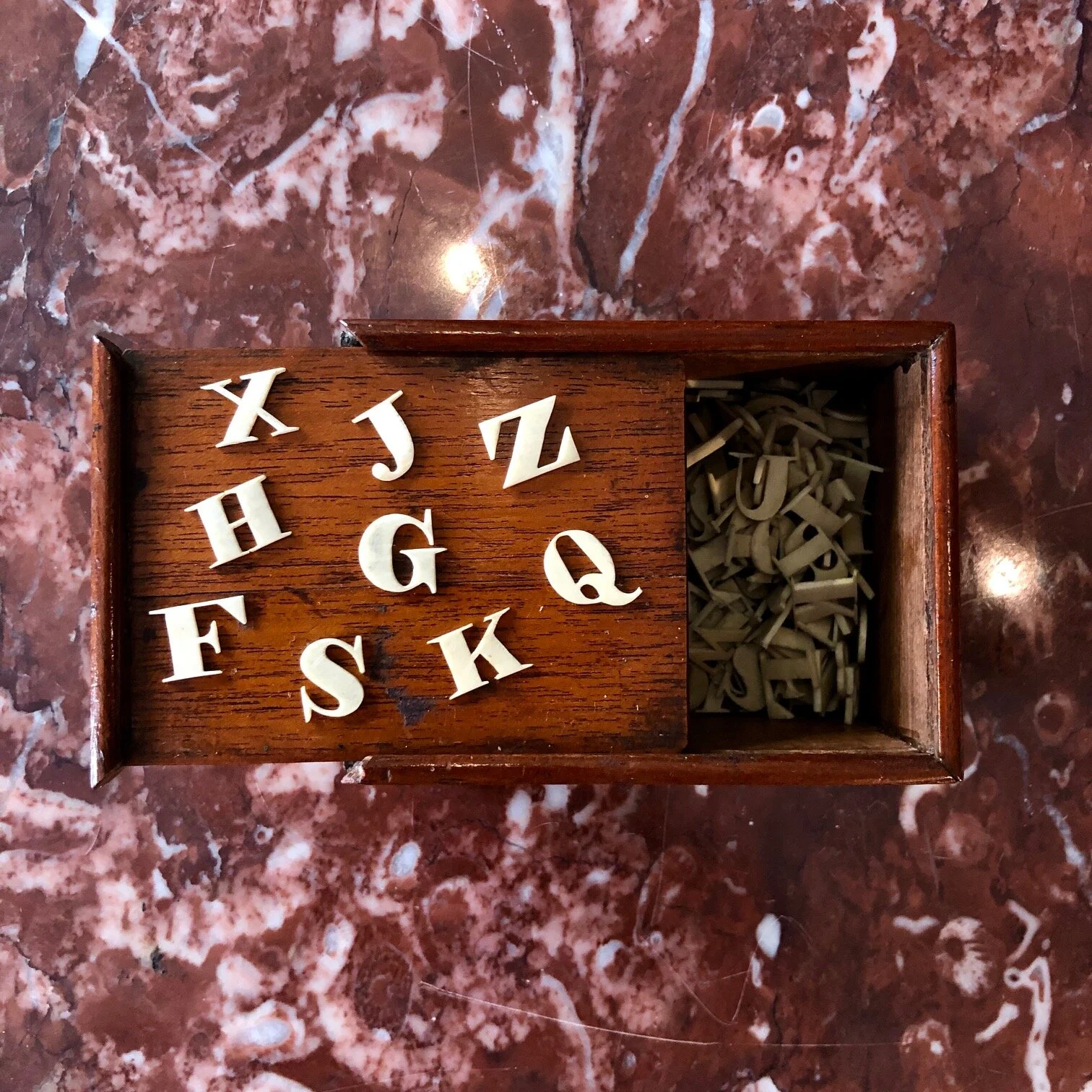 Set of 19th century ivory alphabet letters in original mahogany box, English circa 1860 antique