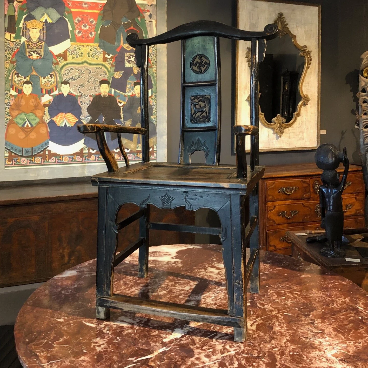 A pair of 19th century Chinese Yoke back arm chairs