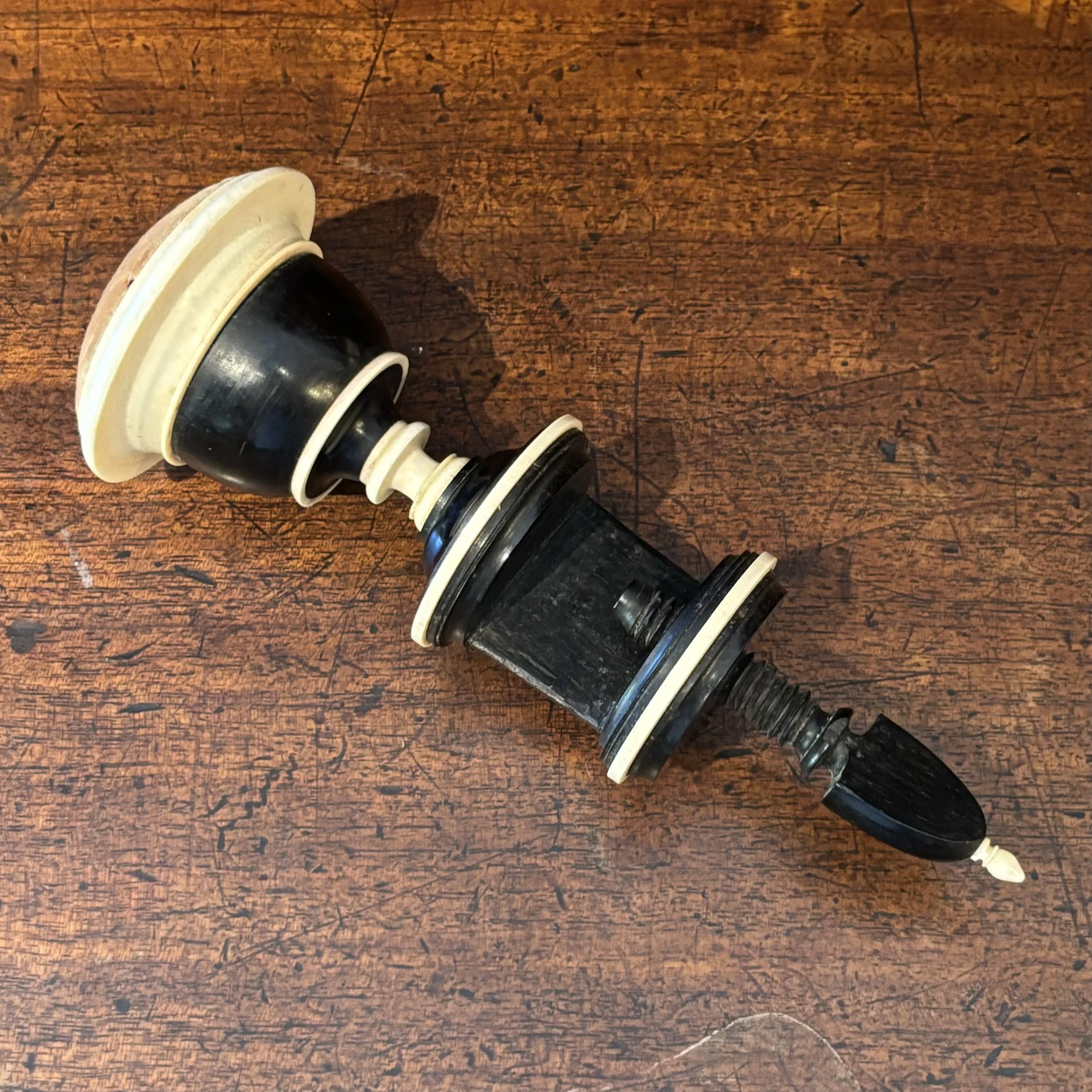 Large antique ebony and ivory sewing clamp c1840.