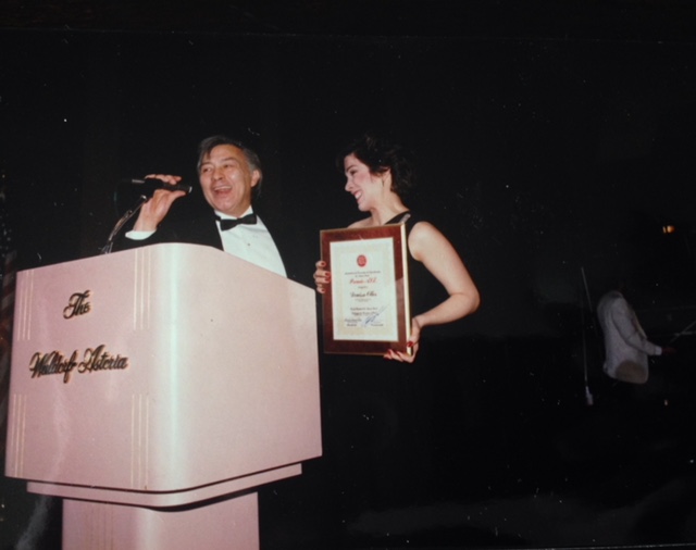 DOller Accepting Award.jpg