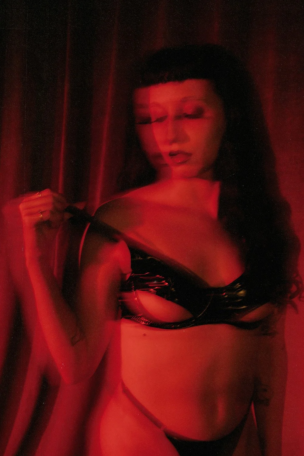 The shadow of a woman, shot during a creative boudoir shoot in Toronto, ON.