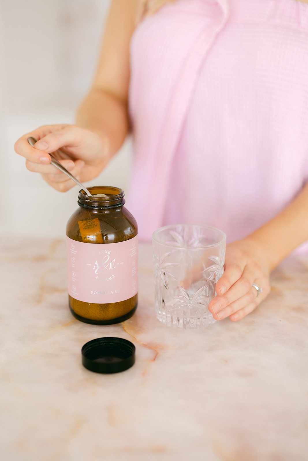 a close up of a product photography for a supplement beauty brand