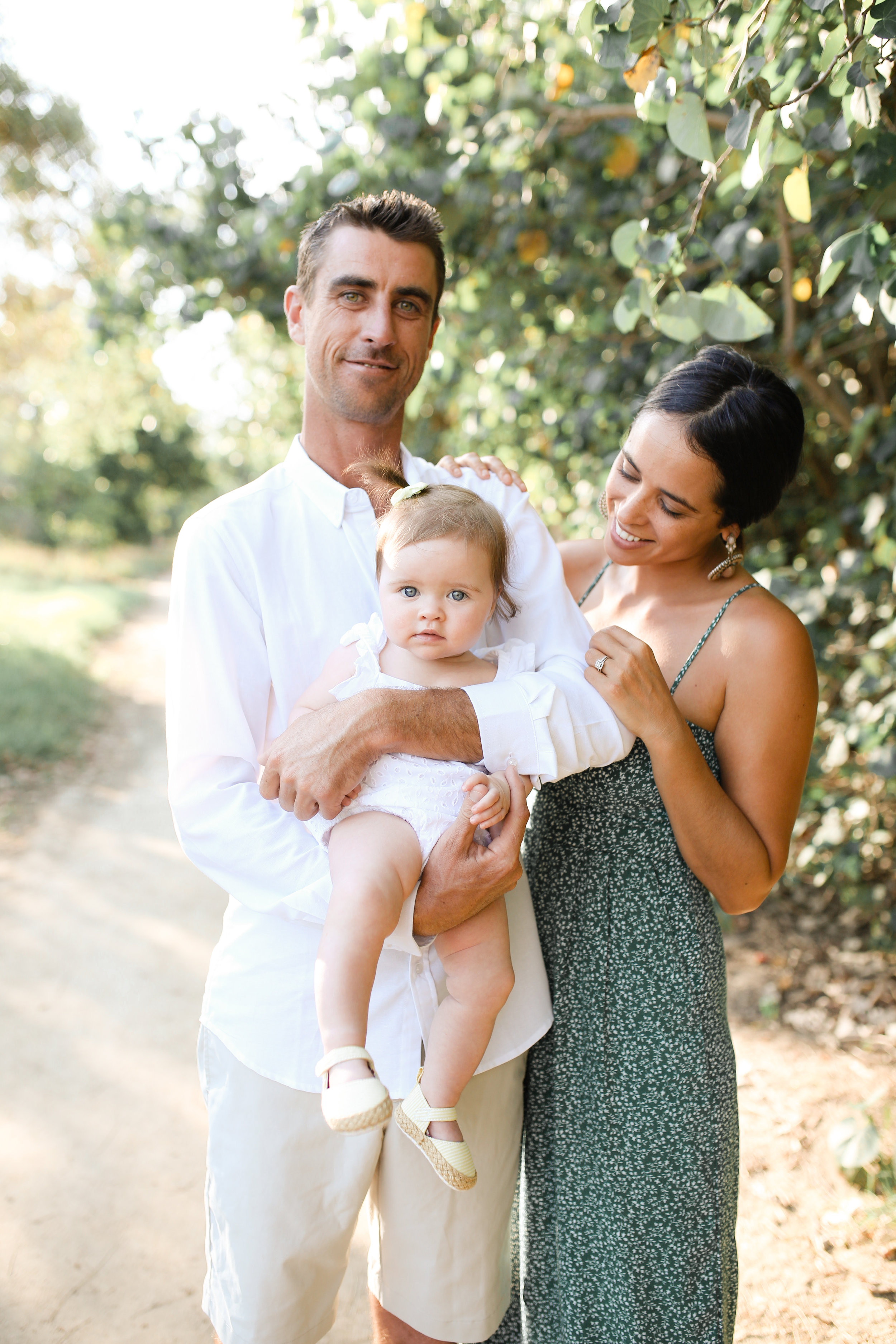 Young family standing together