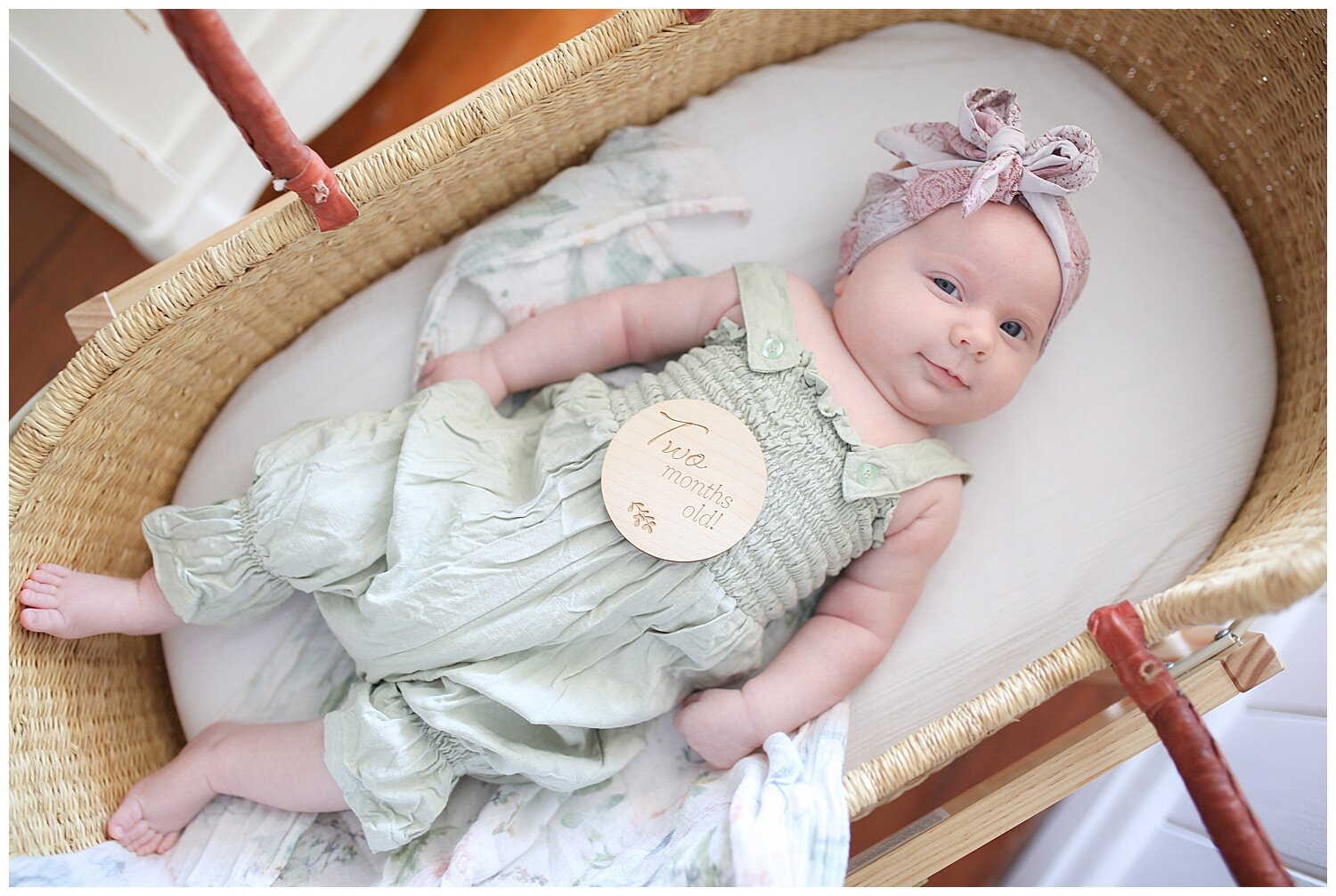 A happy snap of my own daughters milestone photos. These sweet wooden Knock Knock Wooden Toys plaque featured in her monthly milestone photos.