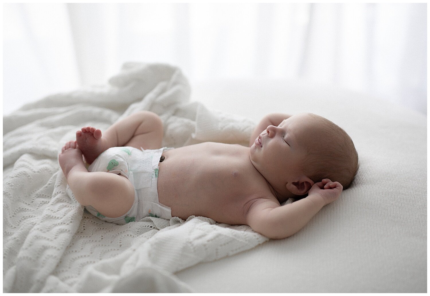 I find by keeping babies nappy on during the session it helps Bub to feel safe, warm and secure. Plus is there anything cuter than a newborn in their teeny tiny nappies.