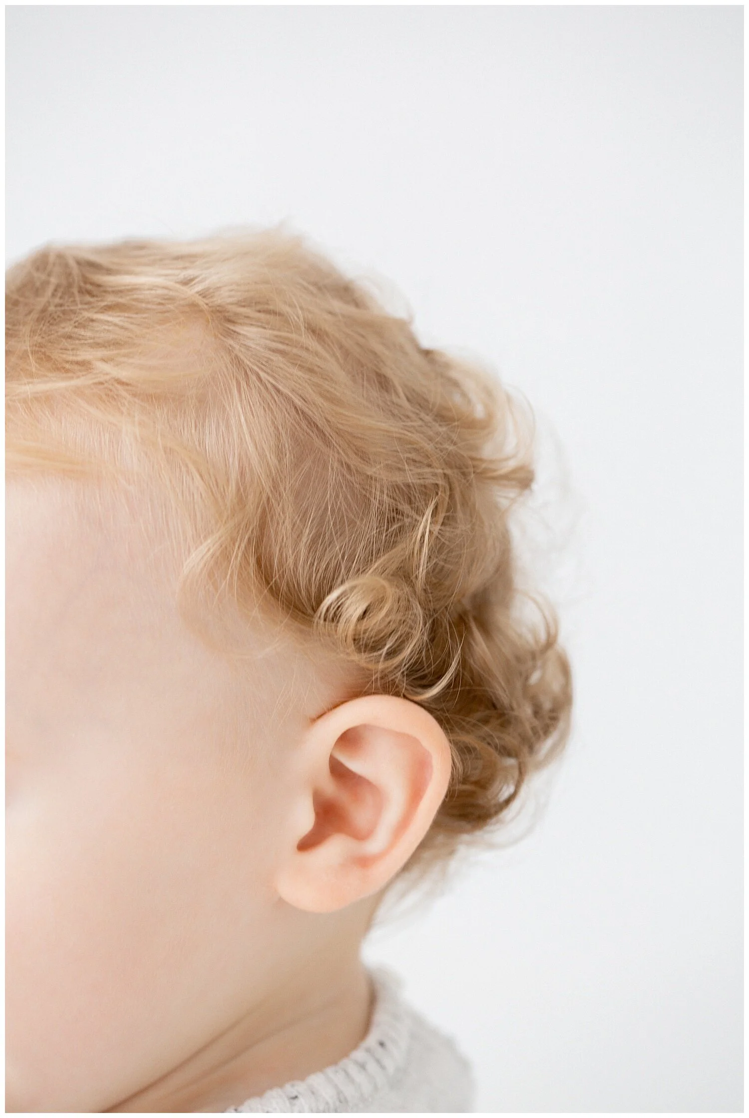 Blonde, curly baby curls