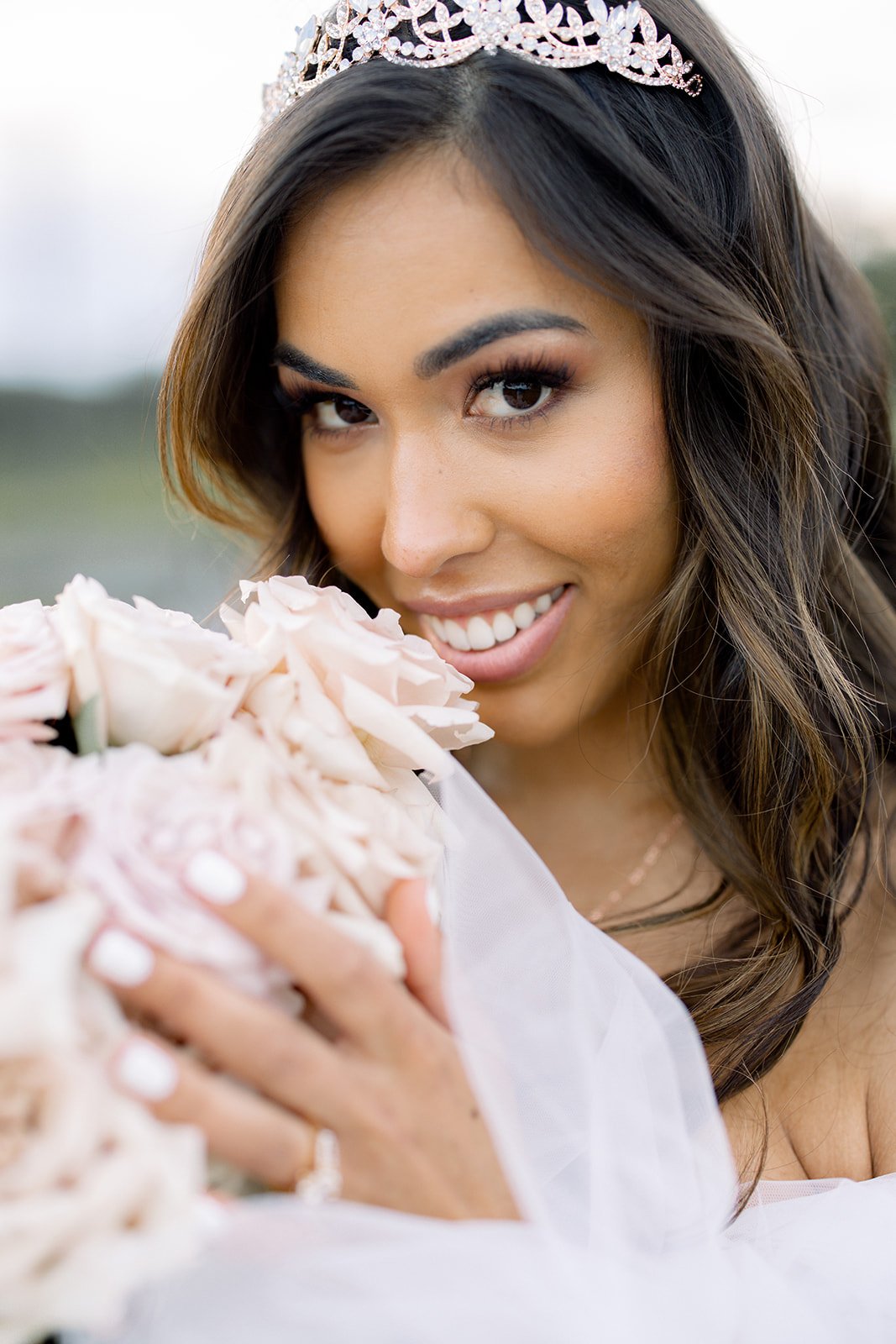 Bride photographed with her bouquet