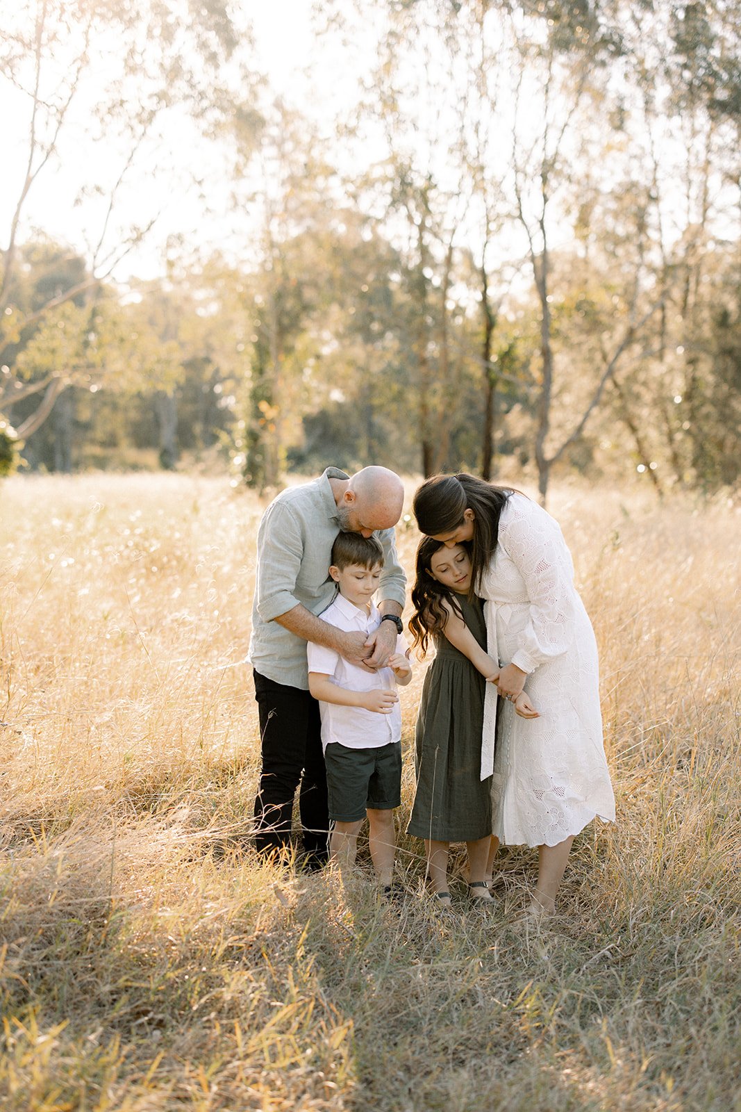 Group hug for a family of four 