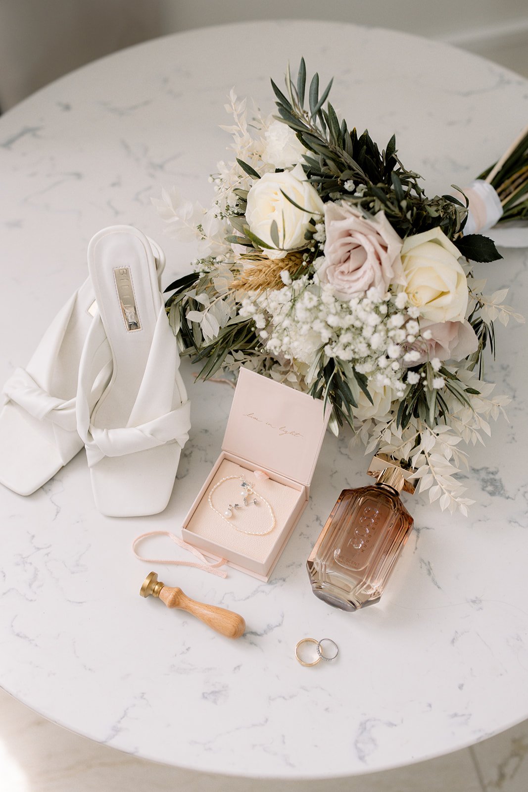 bridal details photographed on a beautiful marble table