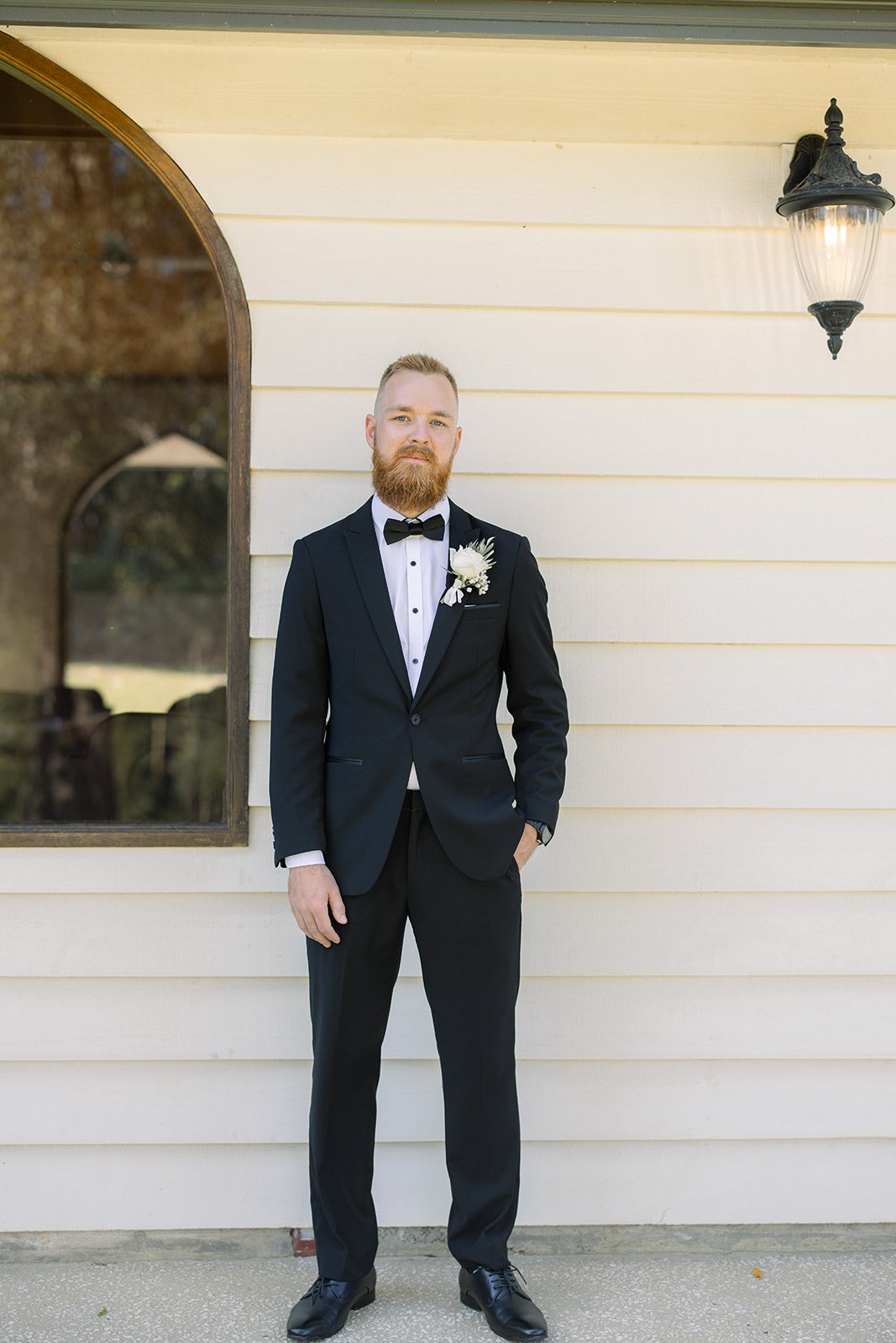 Brisbane groom in black and white suit portrait