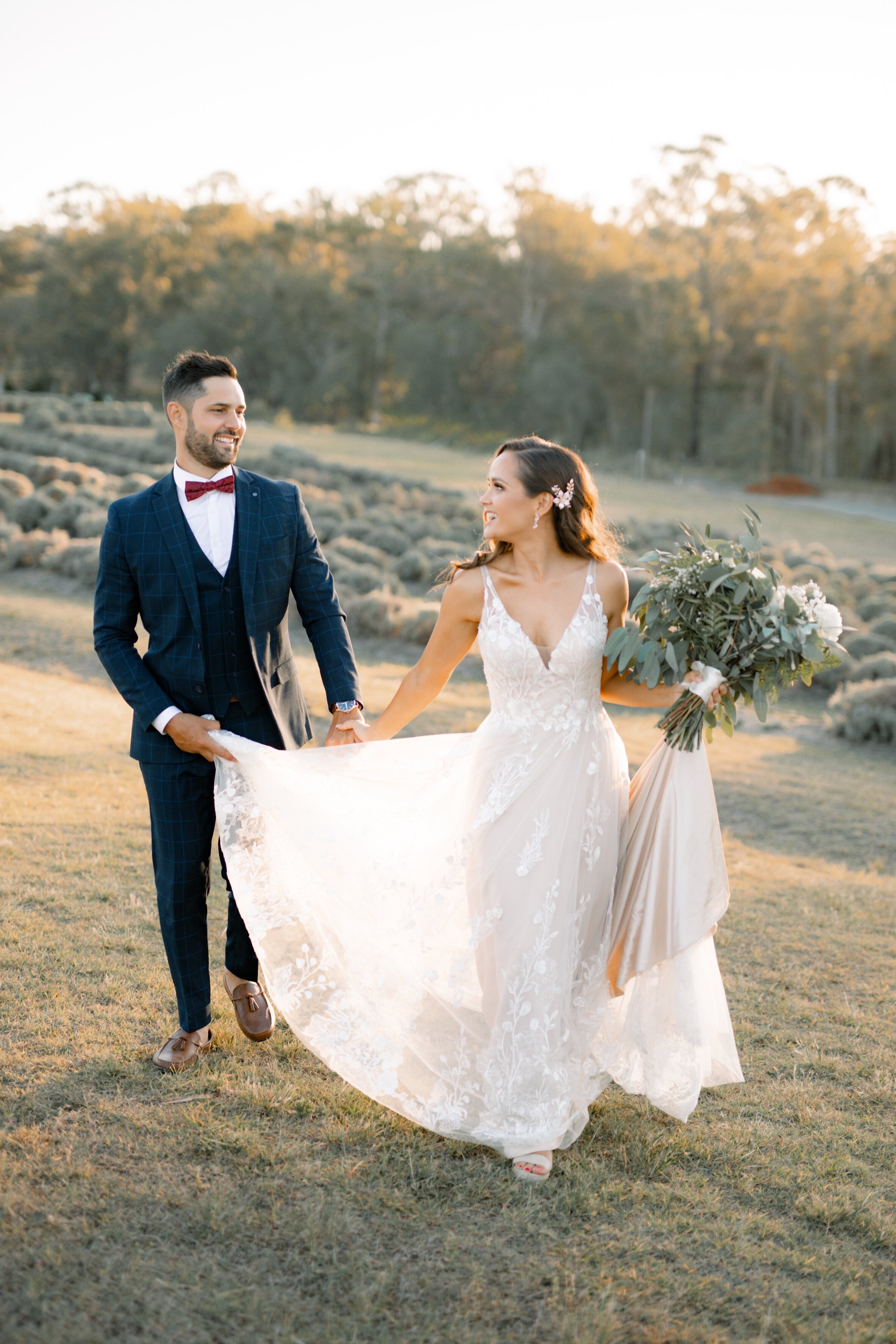 Bride and groom at Brisbane Sirromet Winery lavender field