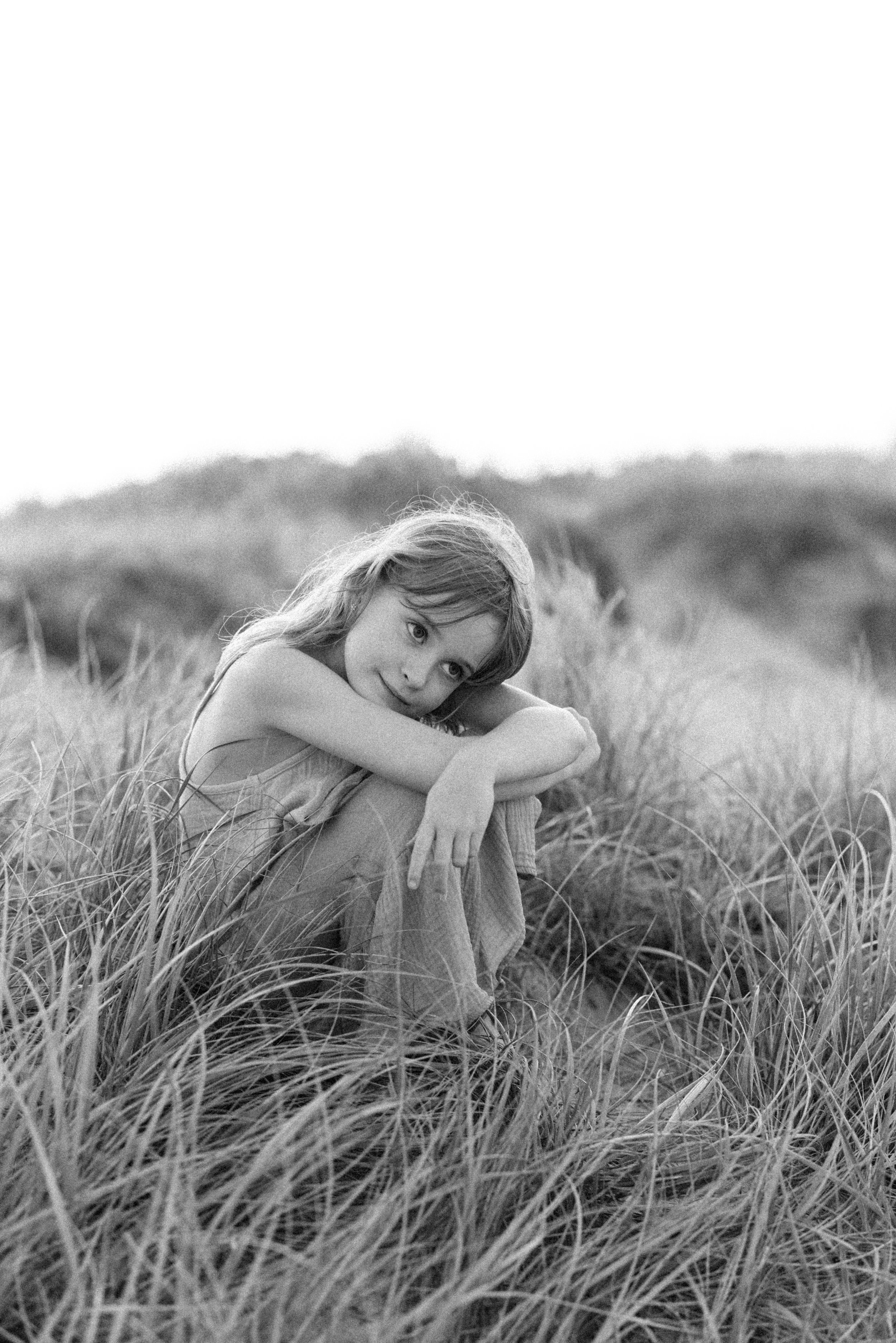 Black and white photograph of young girl at Gold Coast beach