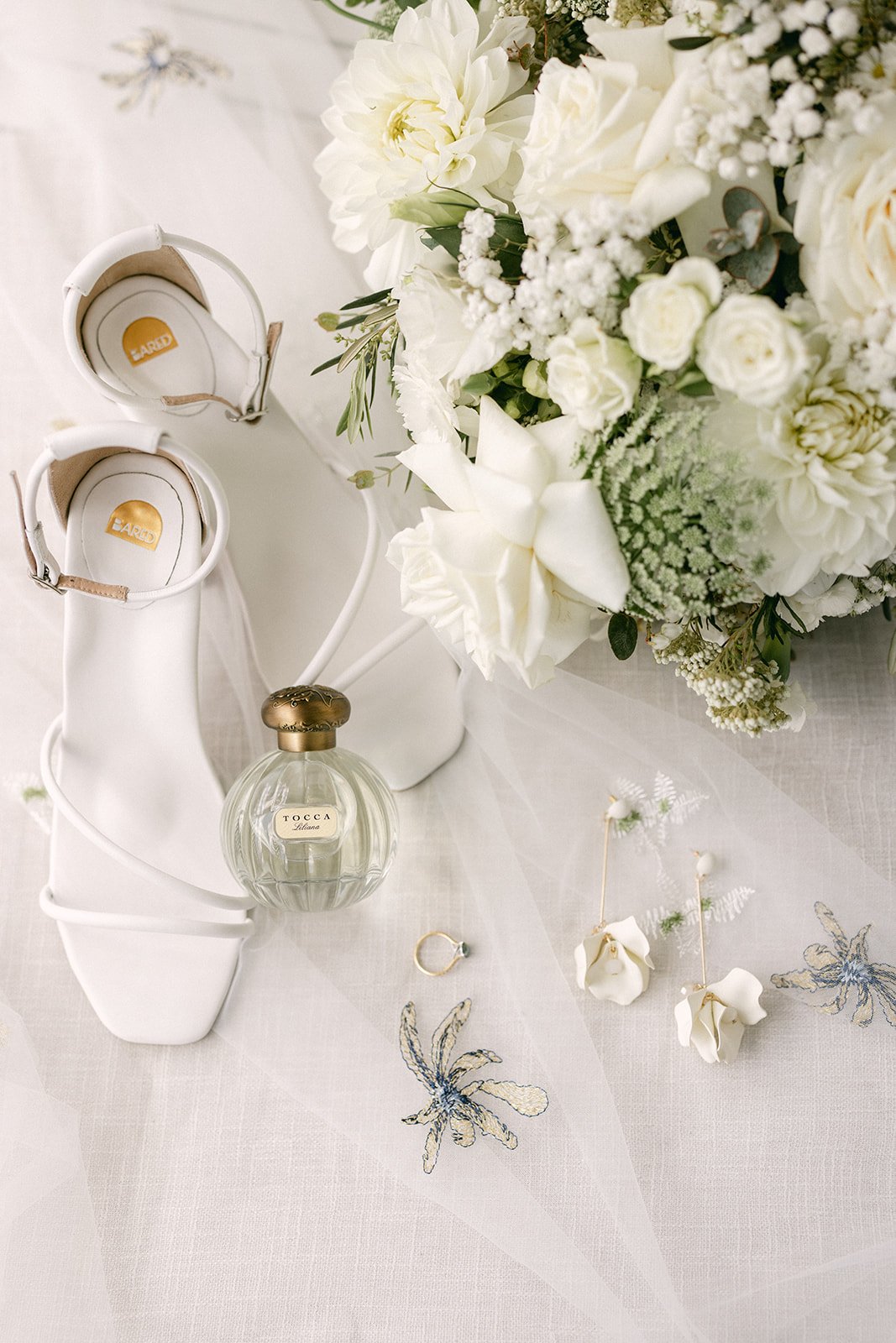 A brides wedding details captured in a beautiful flatly. 