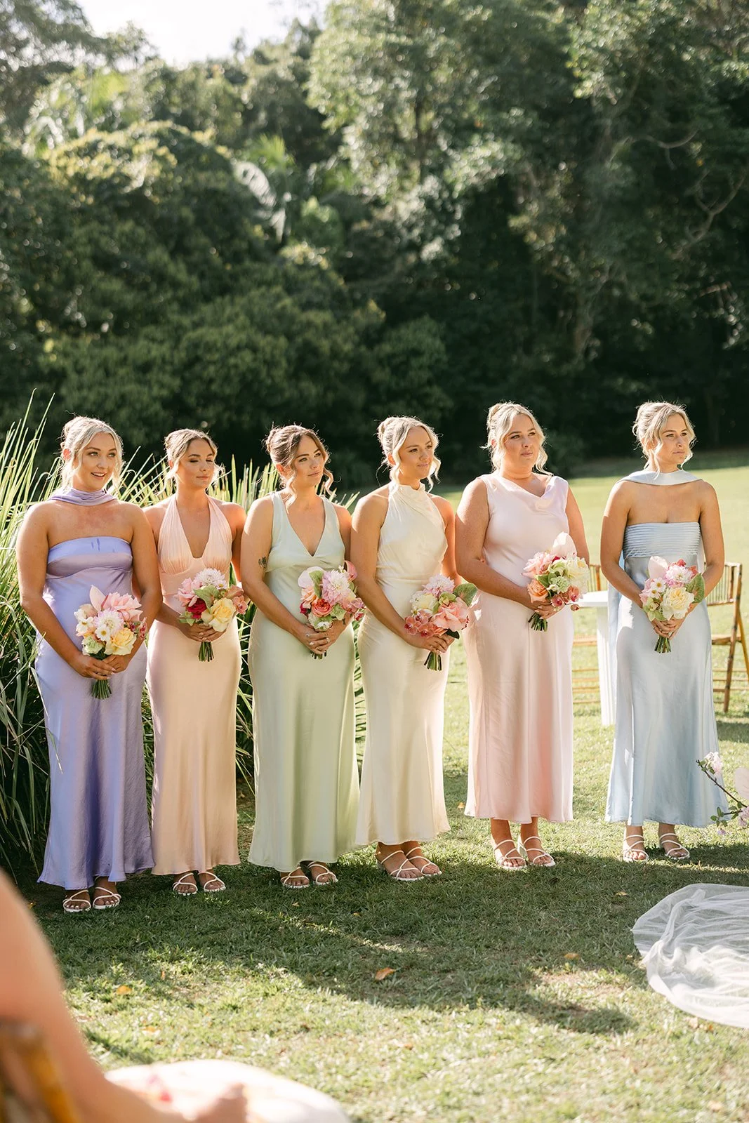 Bridesmaids lined up at aisle