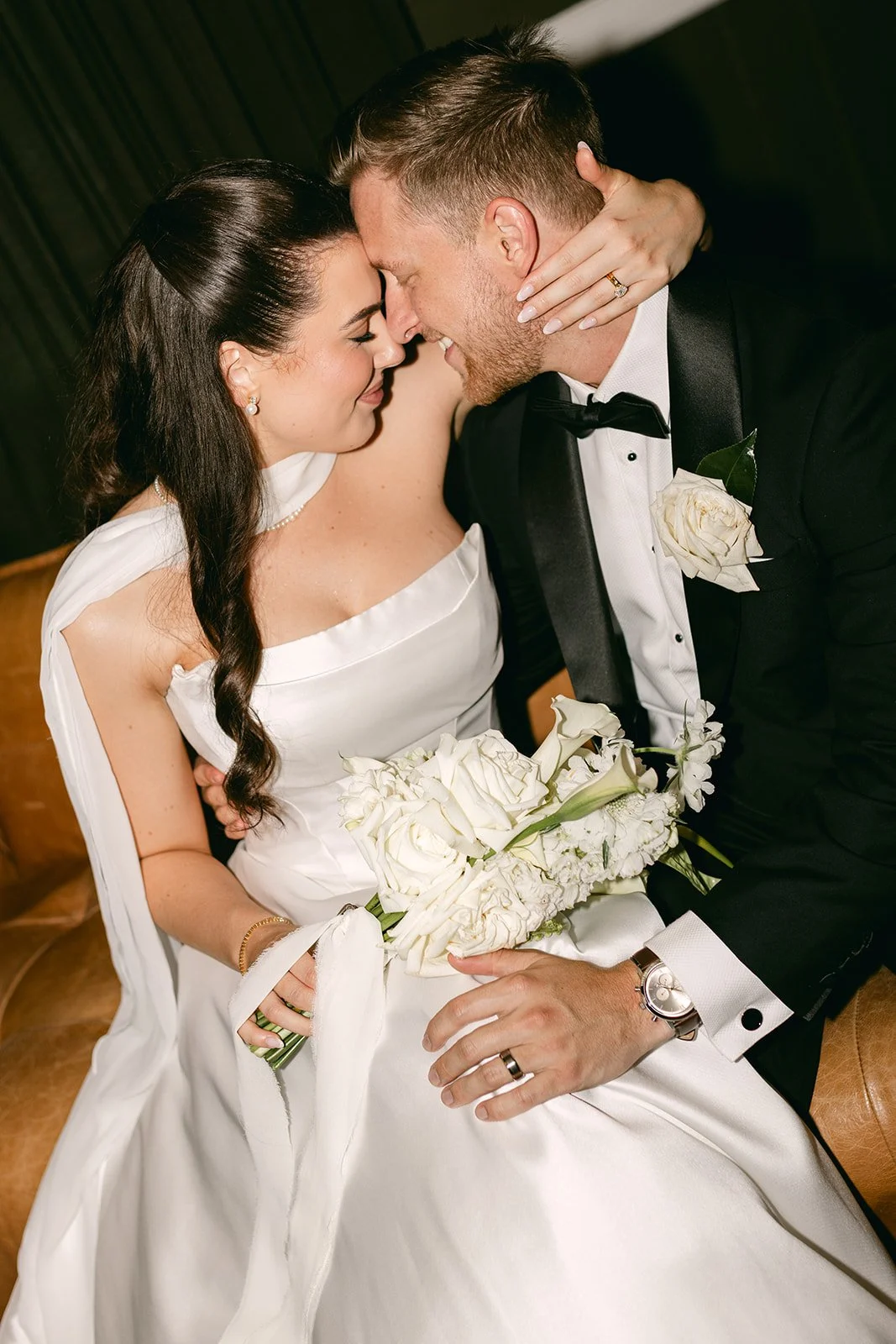 Bride and groom hugging
