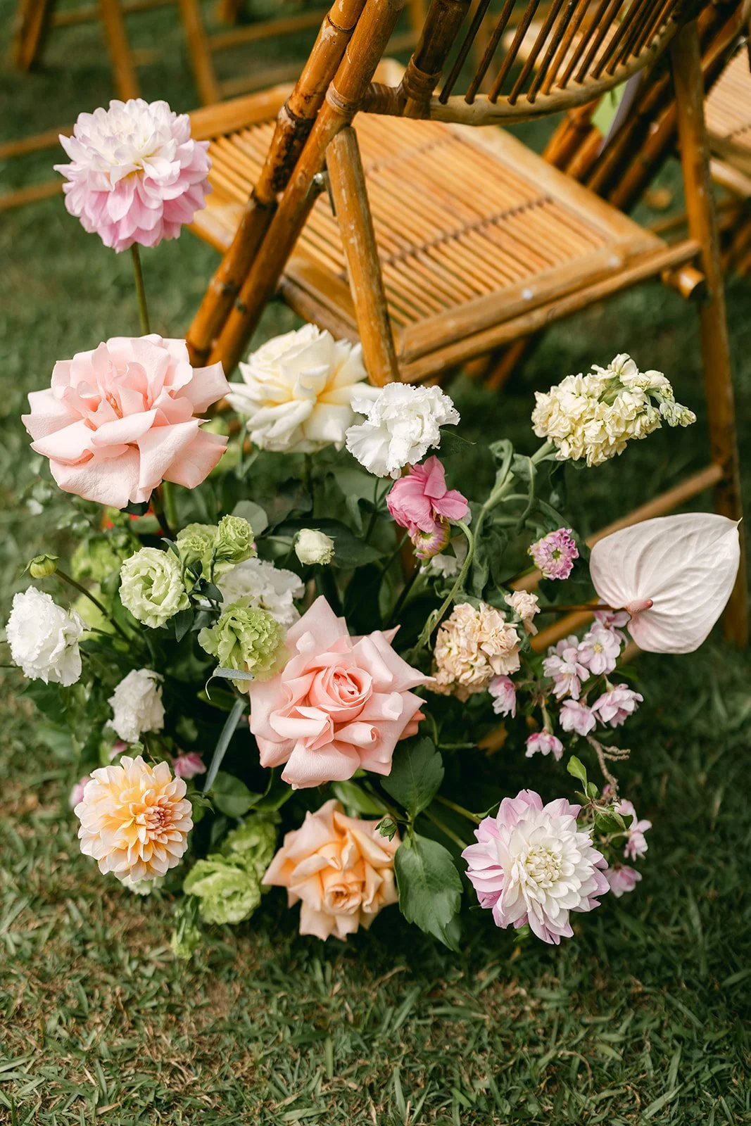 Floral arrangement against guest chair