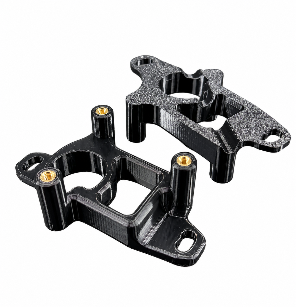 Black 3D-Printed Brackets with Brass Inserts.png