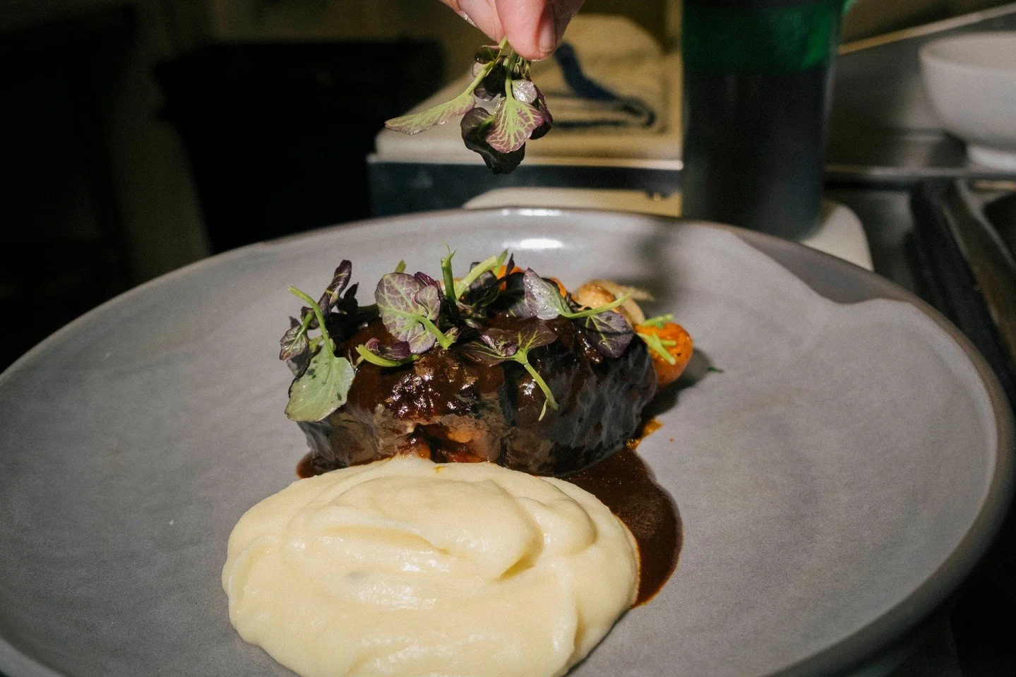 This is what patience tastes like. Eight hour braised Creekstone Farms short rib, sealed in its own juices, glazed with red wine demi, finished with fig and caramelized onion jam. Served with whipped garlic mash and confit vegetables. Worth the wait.