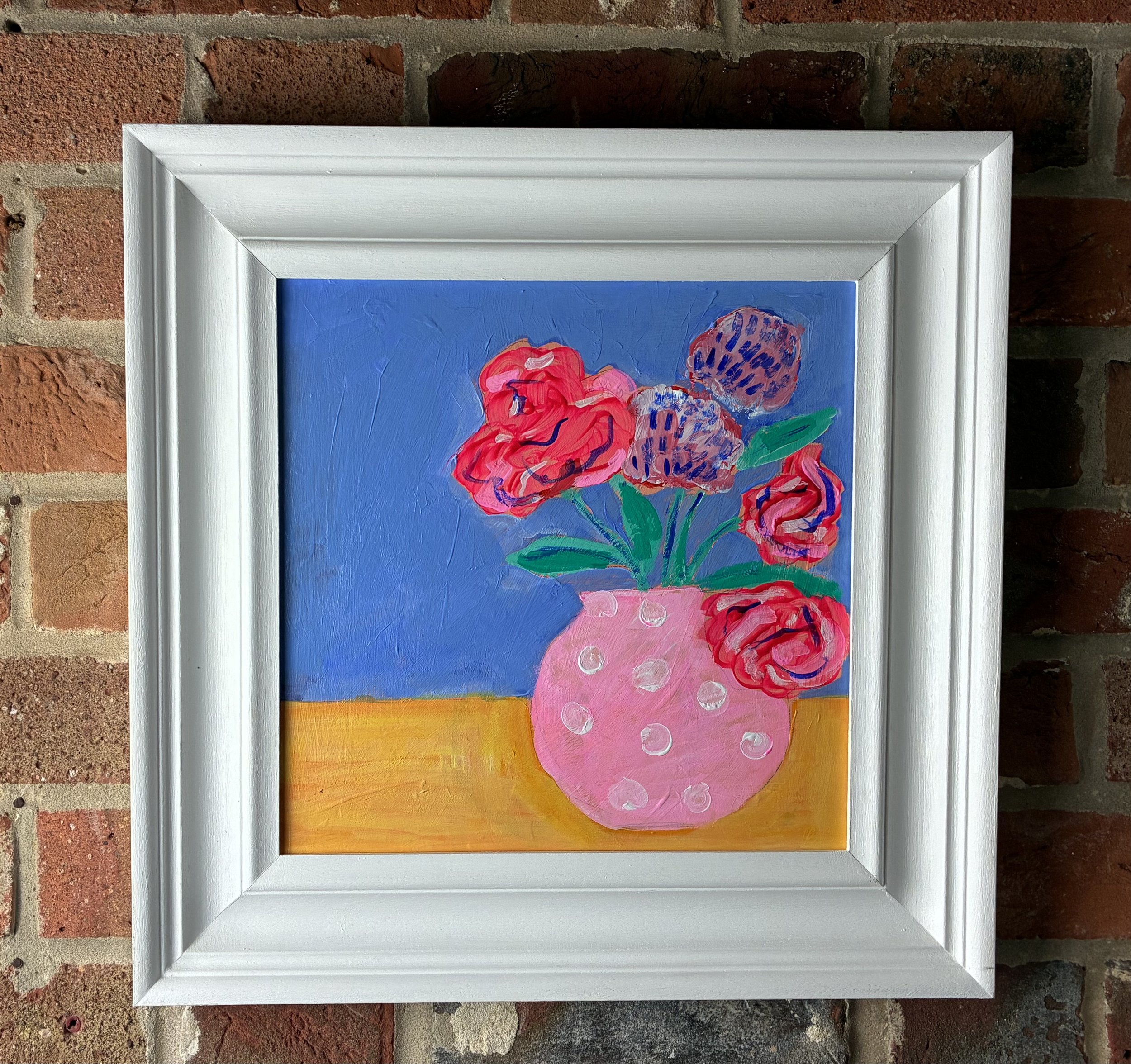 Camellias in dotty pink vase