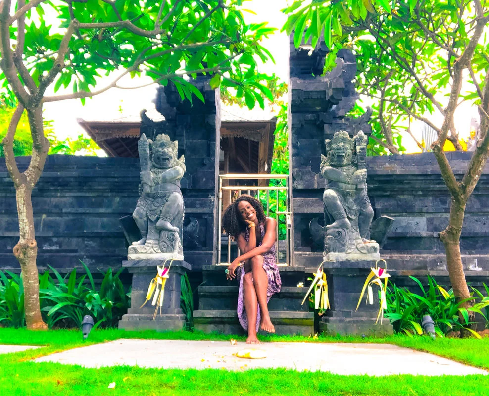  Nestled on the steps of a small temple in Sanur 