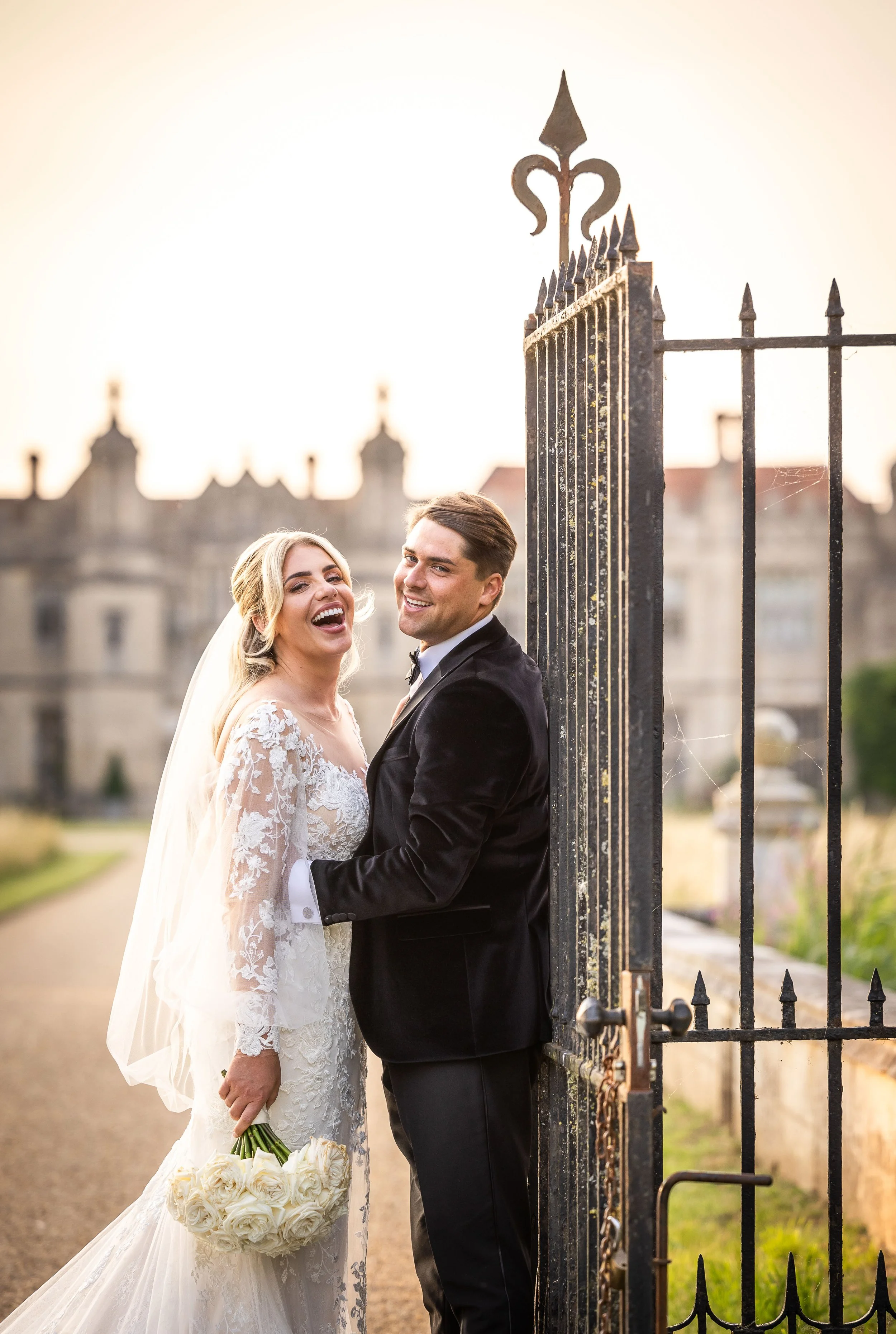 Hengrave Hall couple by gate
