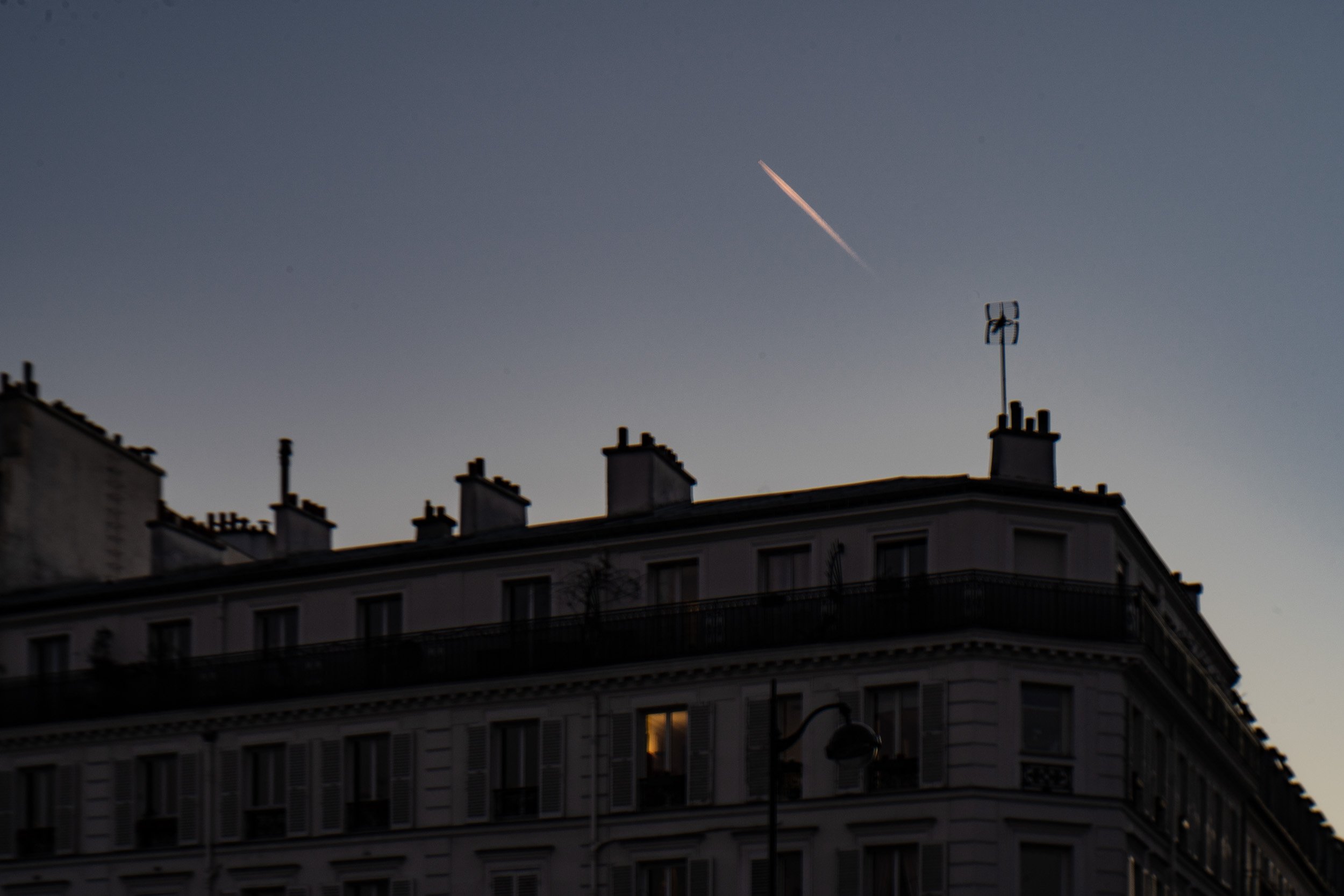 024-trace-of-plane-evening-sky.jpg