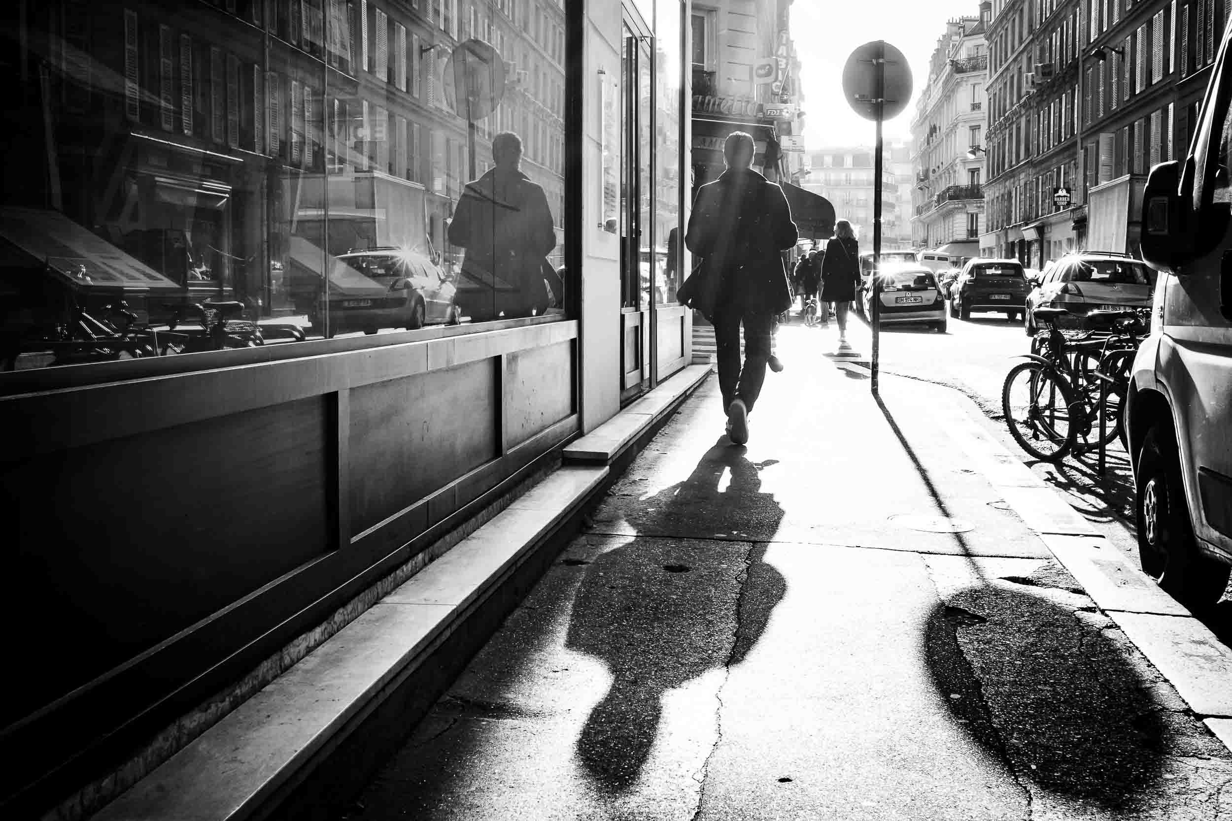 030-shadow-and-reflection-man-waling-street-hard-light-paris.jpg
