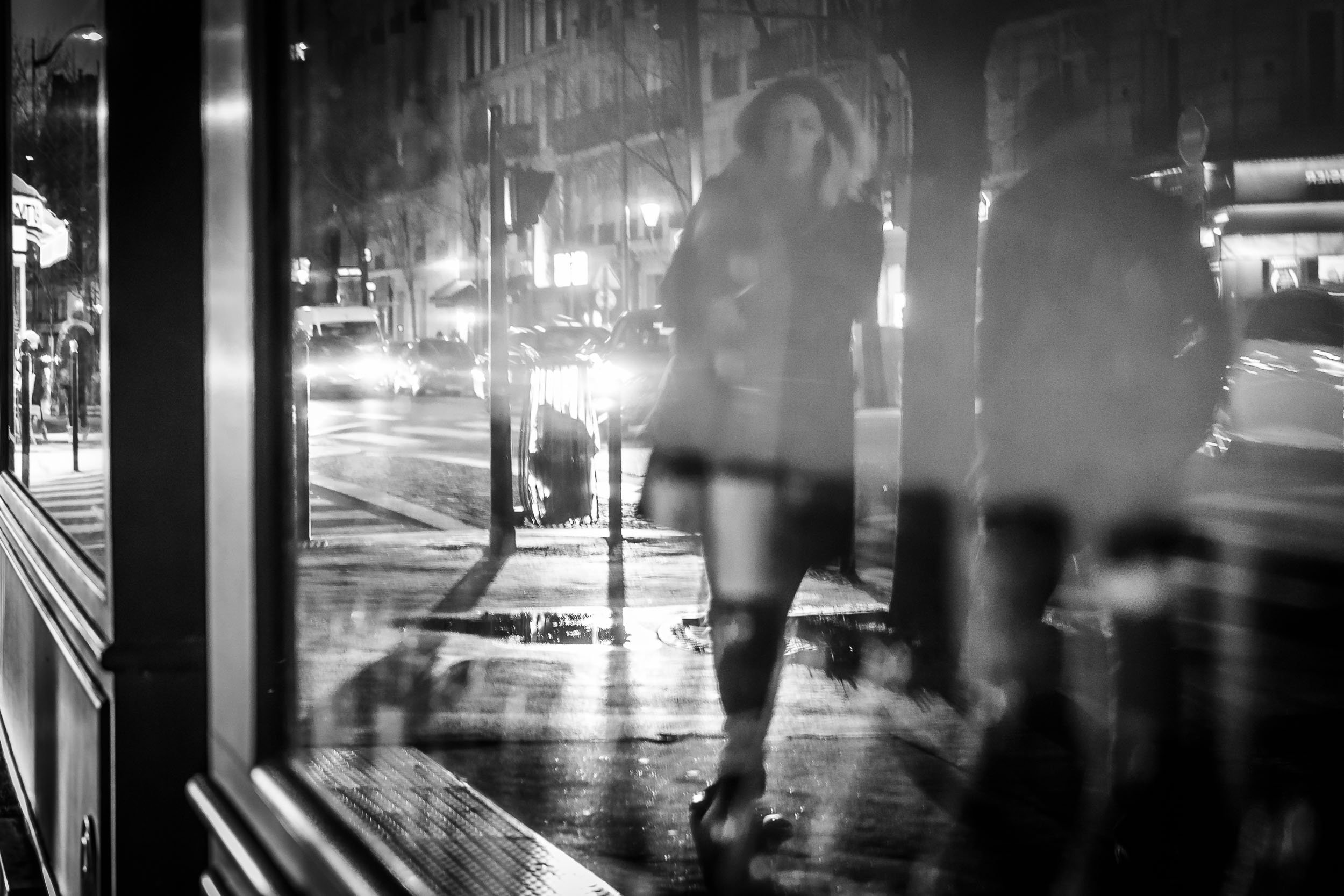 055-reflection-window-woman-street-evening.jpg