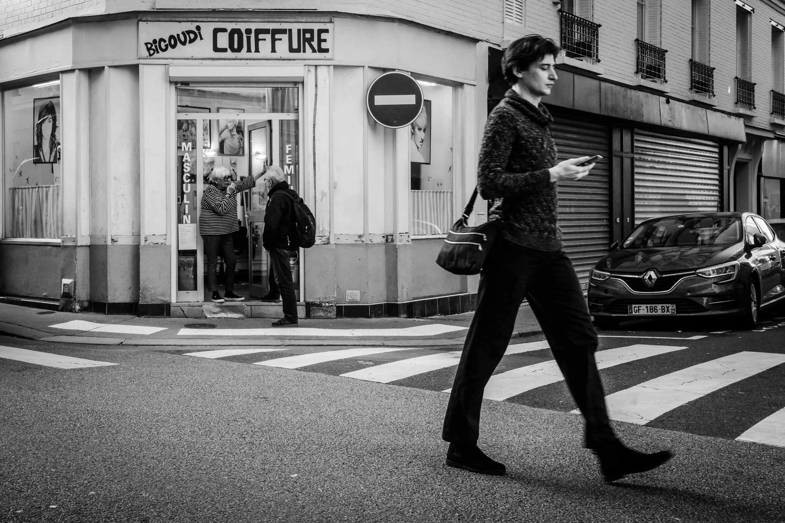 1-people talking at hairdressers door while young man walking by-merja varkemaa photography.jpg