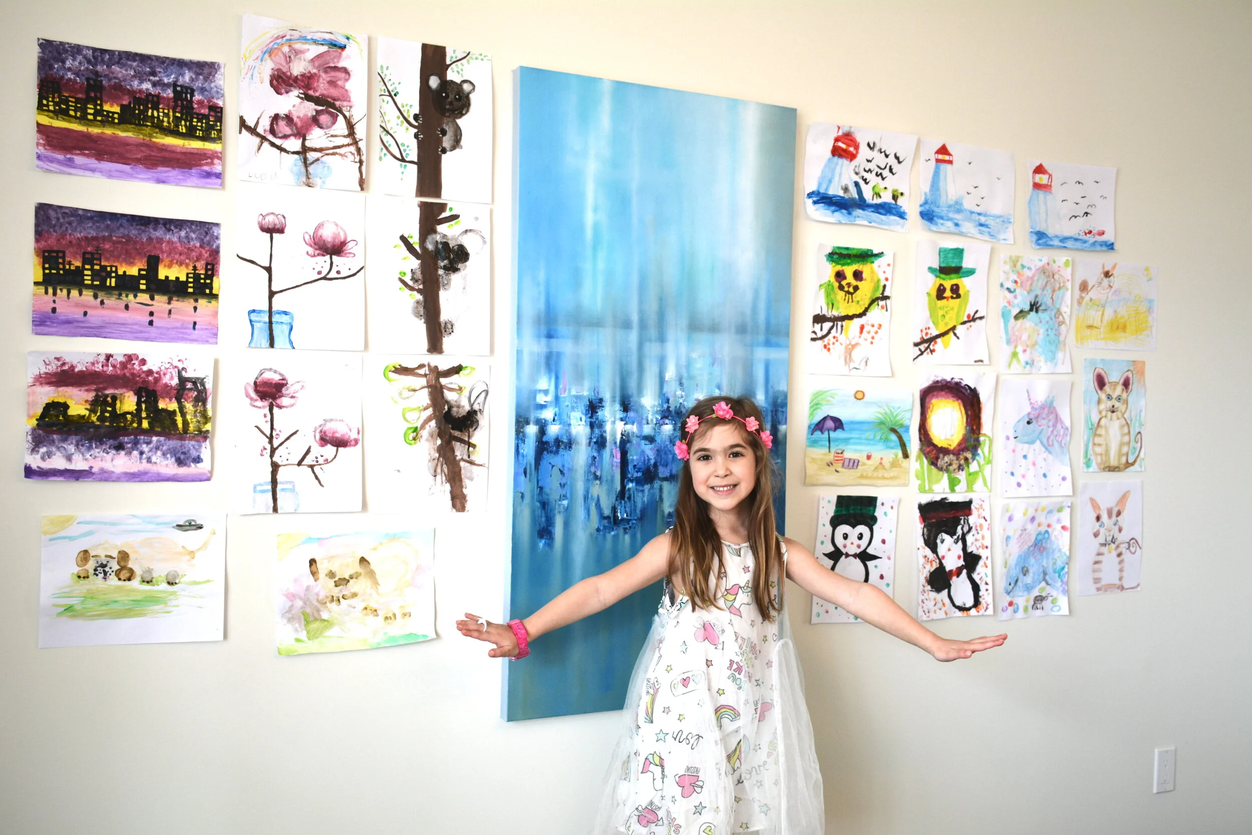  Lucia Cabrera, in front of her personal gallery of artwork competed through Fabiola’s classes 