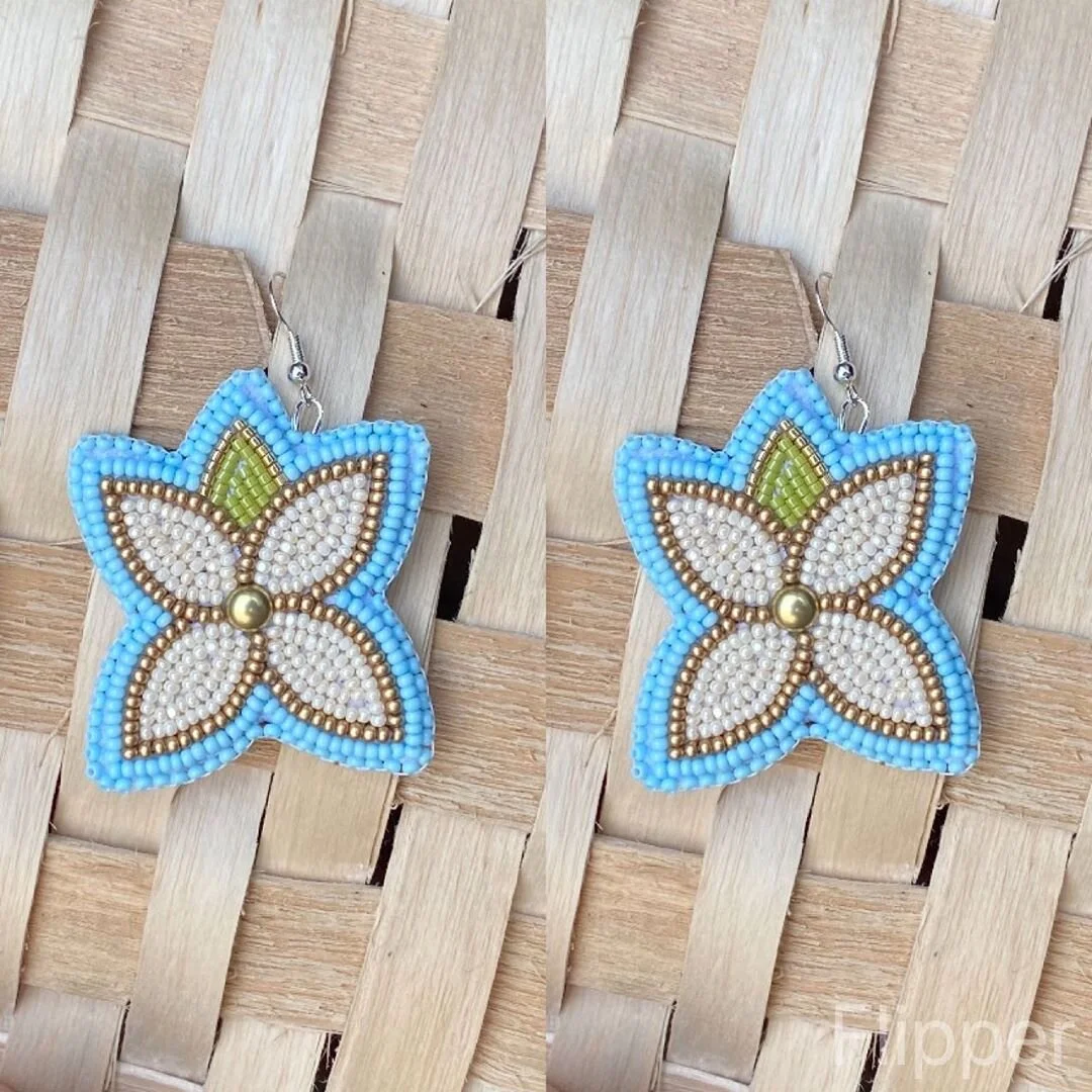 Alexa Metallic frequently uses gold and turquoise beads in her work. Beaded earrings and photo by Alexa Metallic.